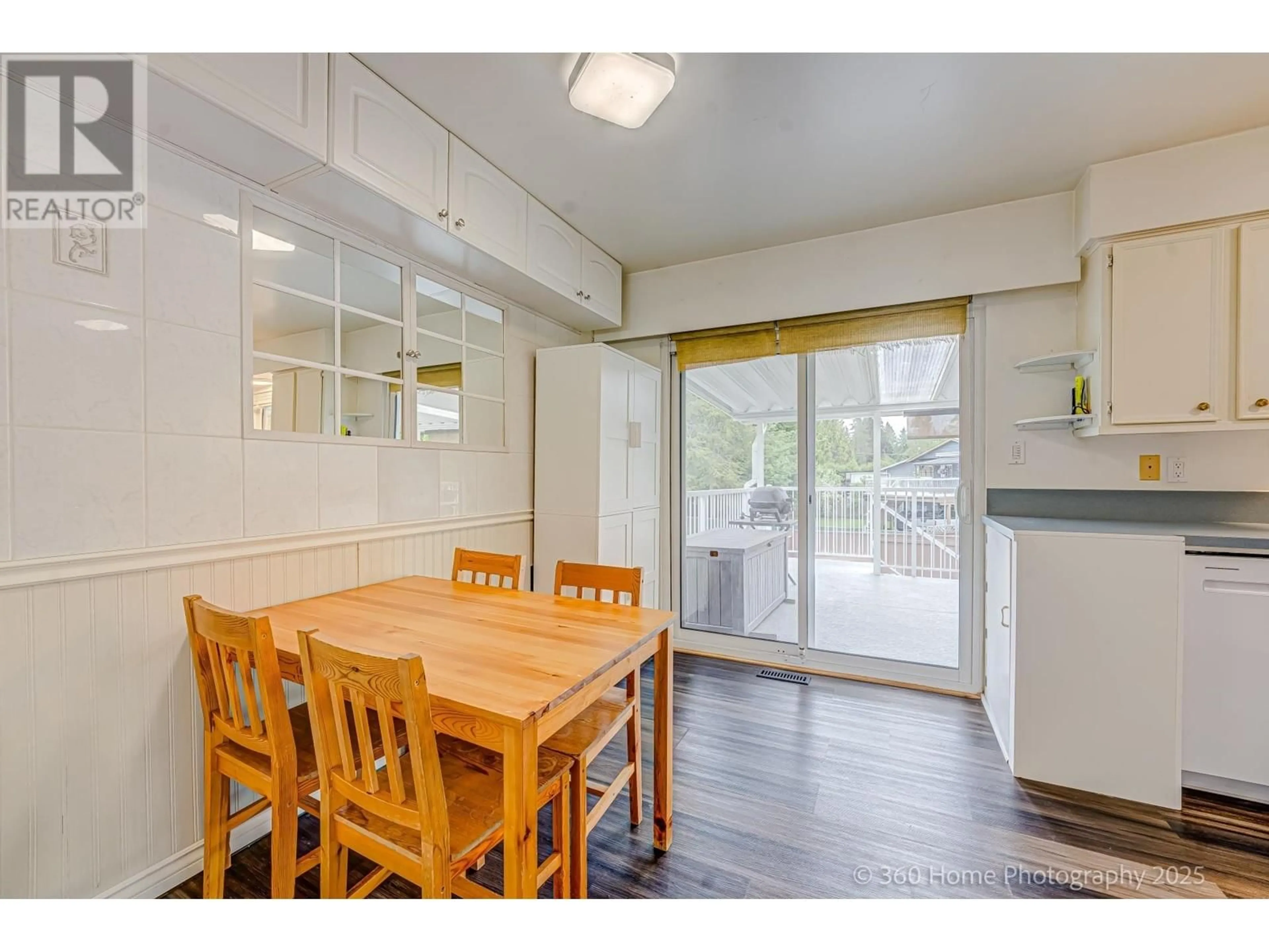 Dining room, wood/laminate floor for 3958 COAST MERIDIAN ROAD, Port Coquitlam British Columbia V3B3P4