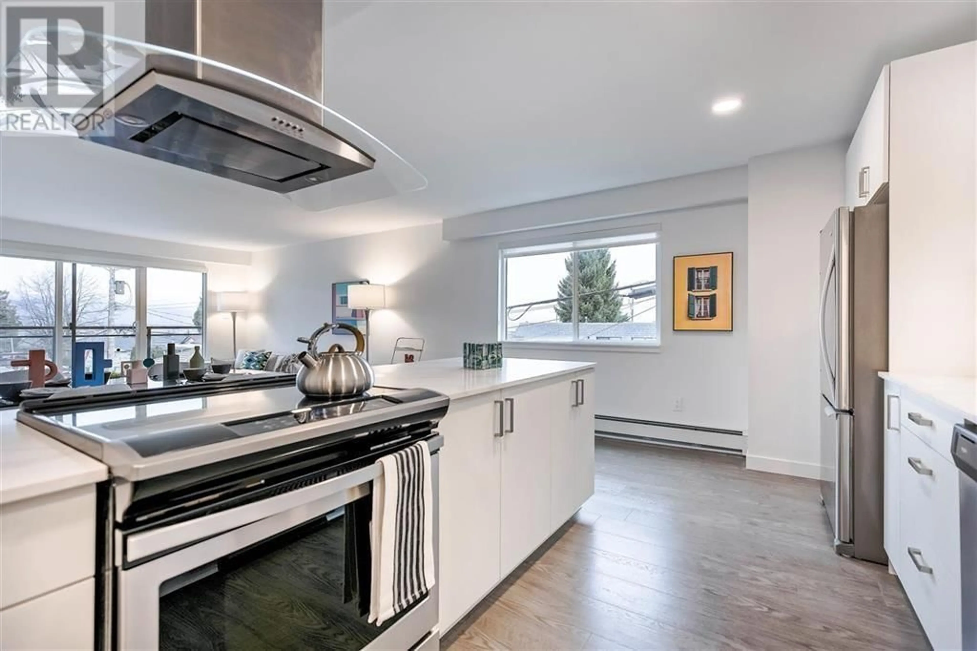 Open concept kitchen, unknown for 205 - 4625 GRANGE STREET, Burnaby British Columbia V5H1R1