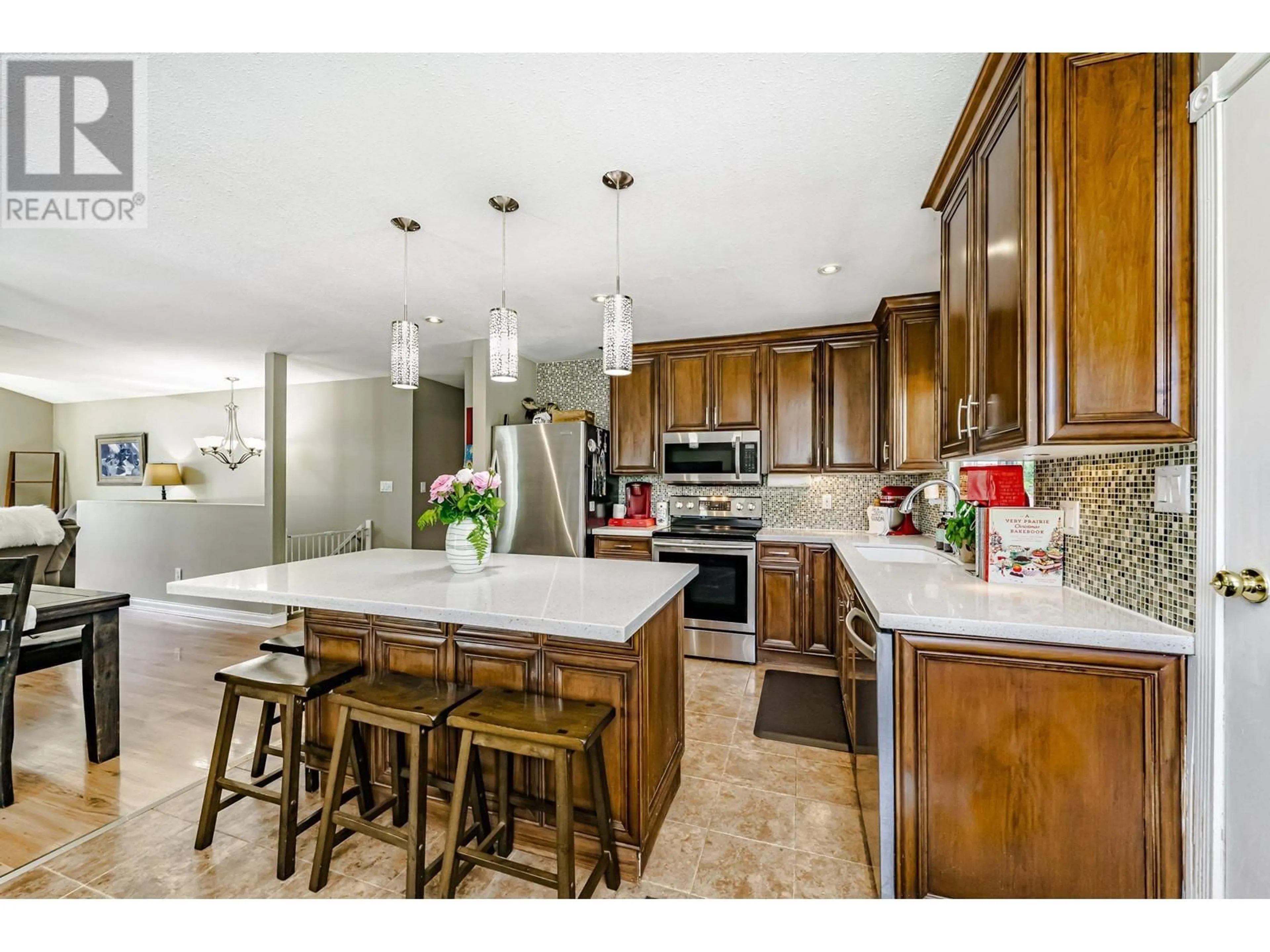Open concept kitchen, ceramic/tile floor for 12512 222 STREET, Maple Ridge British Columbia V2X0W5