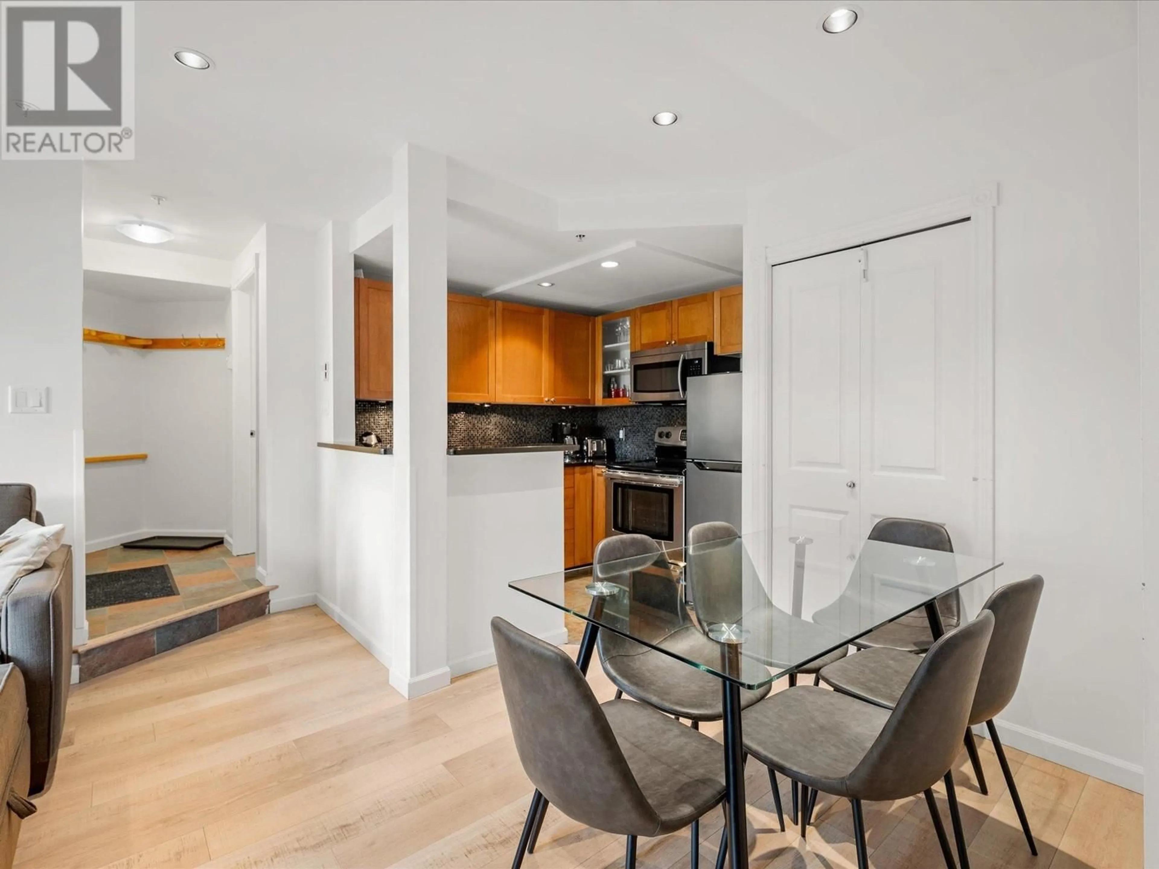 Open concept kitchen, wood/laminate floor for 98 - 4388 NORTHLANDS BOULEVARD, Whistler British Columbia V8E1C6