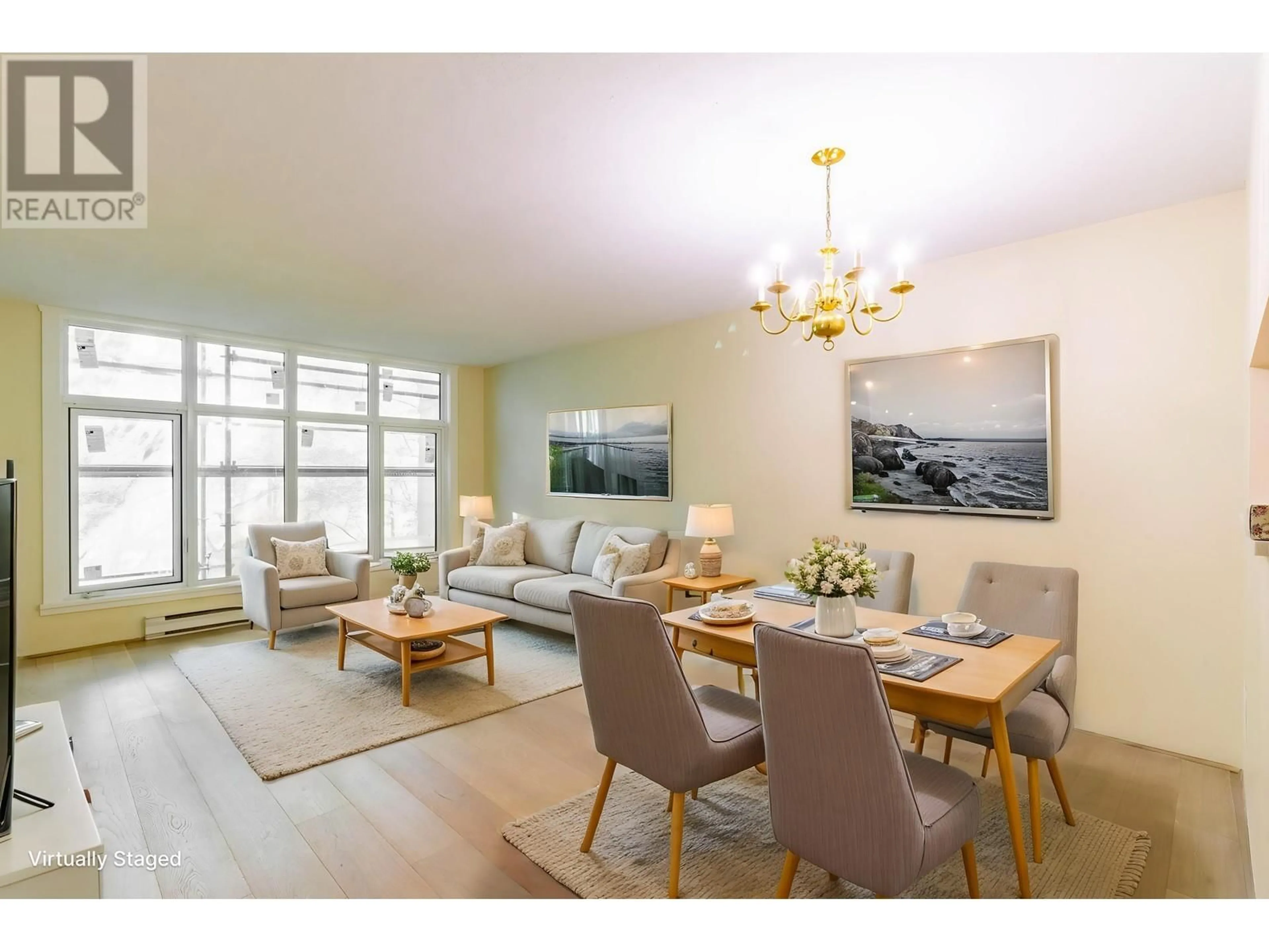 Living room with furniture, wood/laminate floor for 504 - 2528 BROADWAY, Vancouver British Columbia V5M4V2
