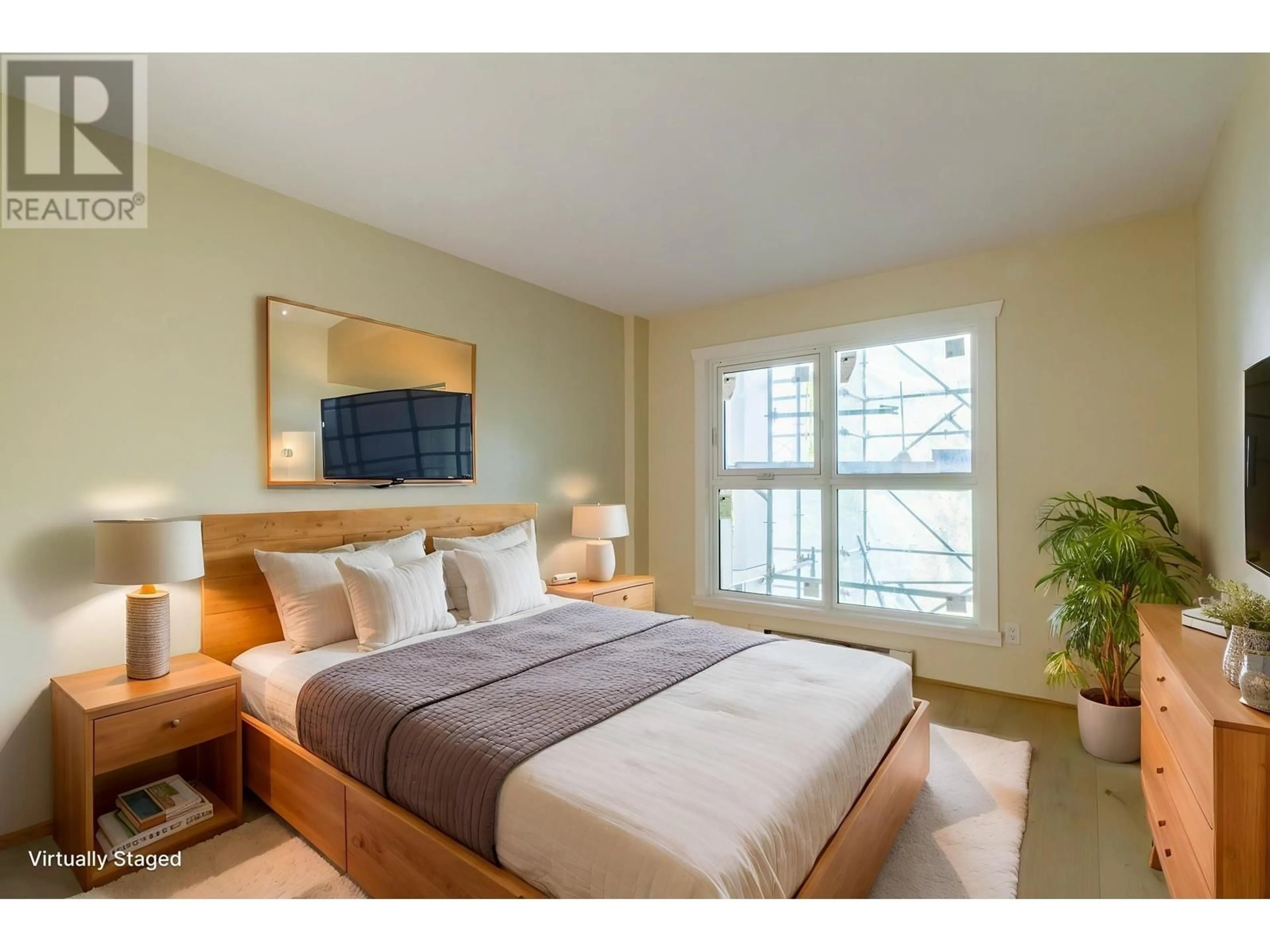 Bedroom with bed, wood/laminate floor for 504 - 2528 BROADWAY, Vancouver British Columbia V5M4V2