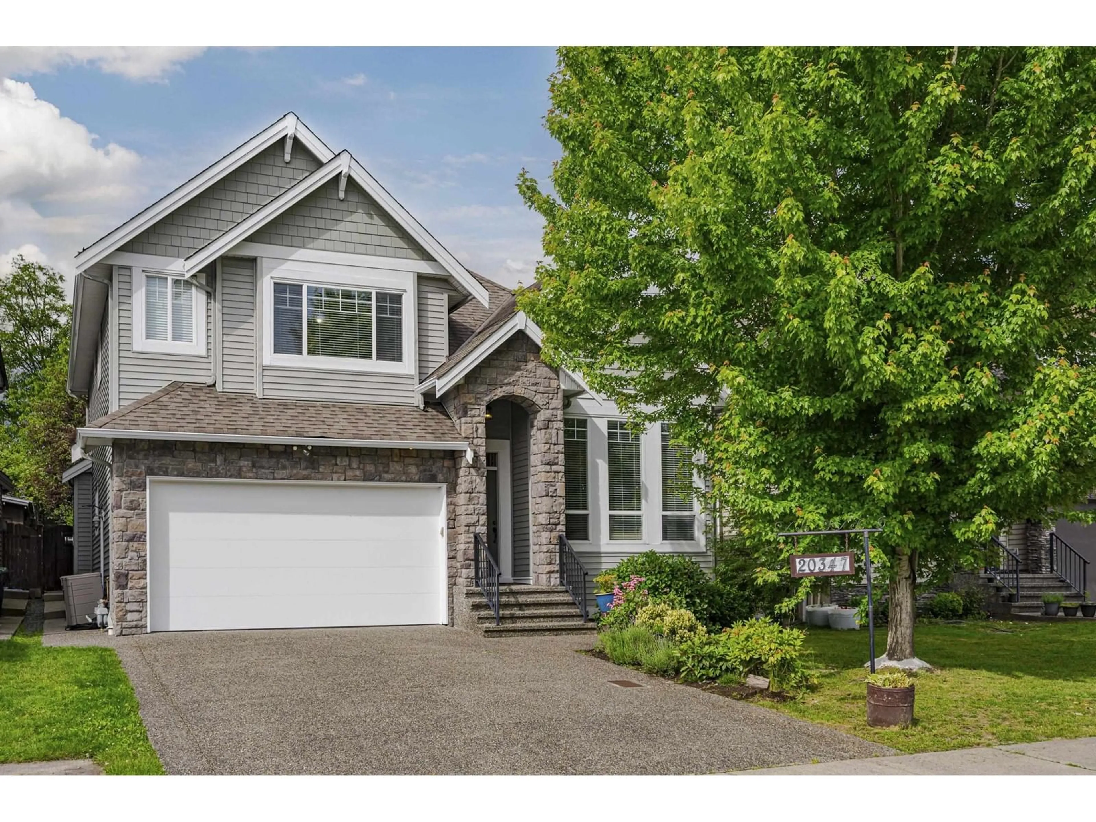 Home with vinyl exterior material, street for 20347 98A, Langley British Columbia V1M0A6