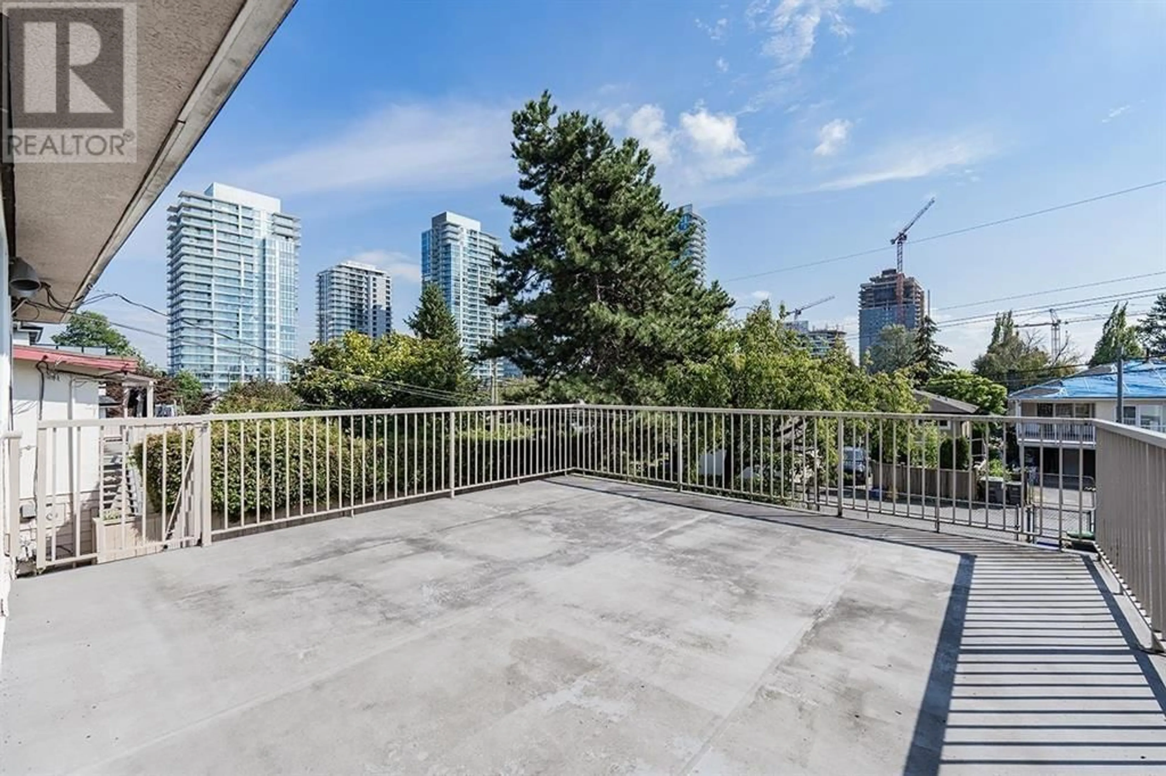 Patio, city buildings view from balcony for 564 64TH STREET, Vancouver British Columbia V6P2K9