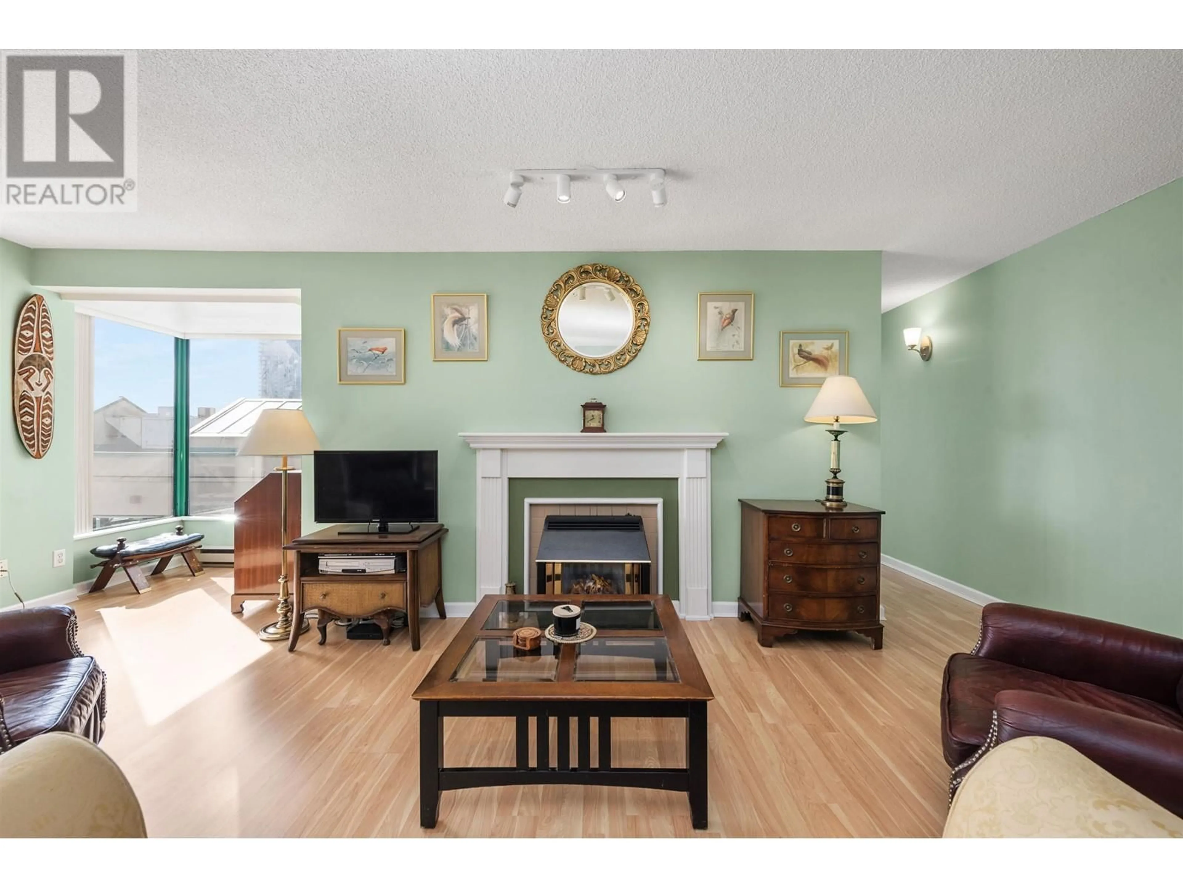 Living room with furniture, wood/laminate floor for 202 - 410 CARNARVON STREET, New Westminster British Columbia V3L5N9