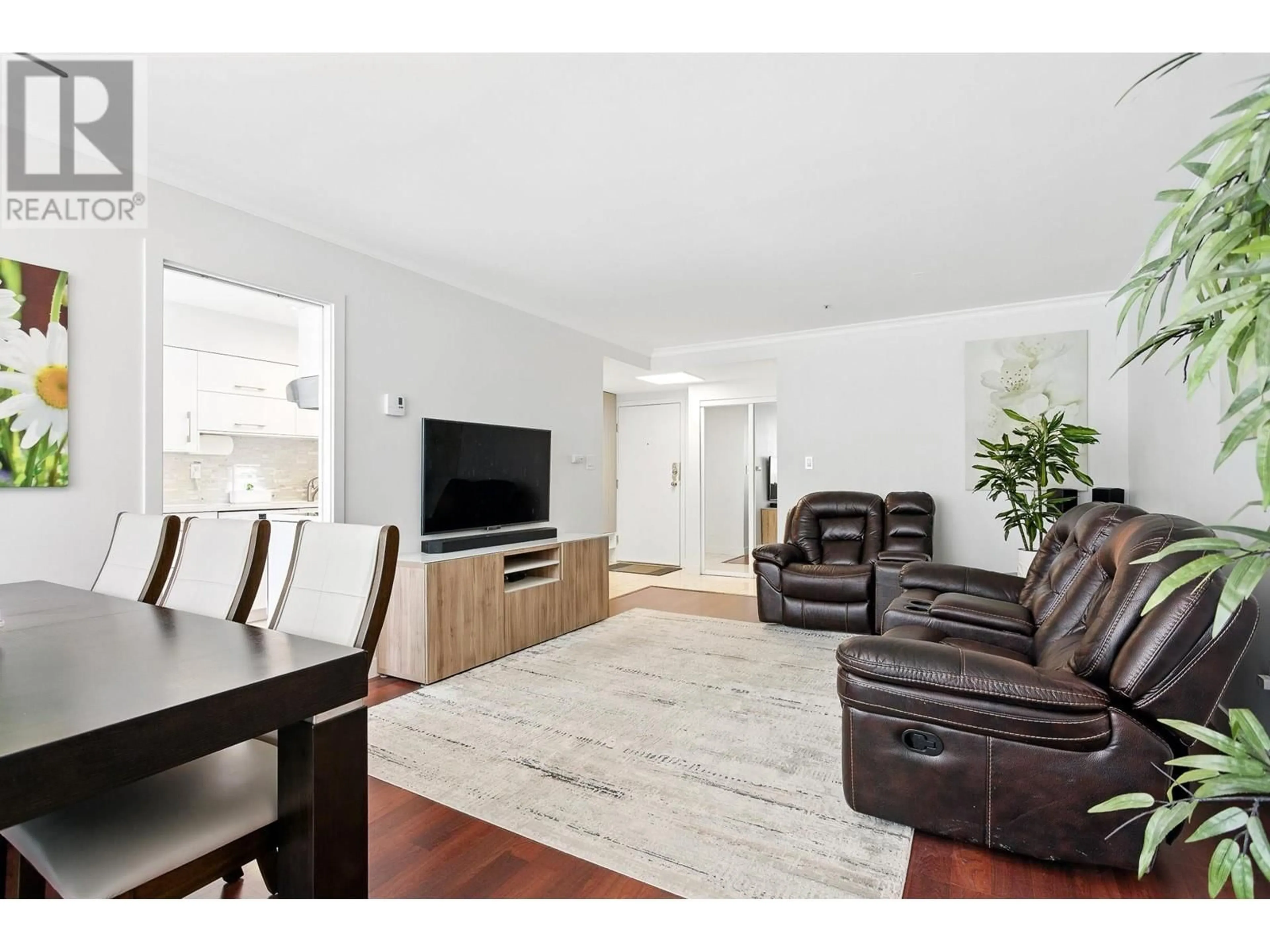 Living room with furniture, wood/laminate floor for 303 - 7700 GILBERT ROAD, Richmond British Columbia V7C3W2