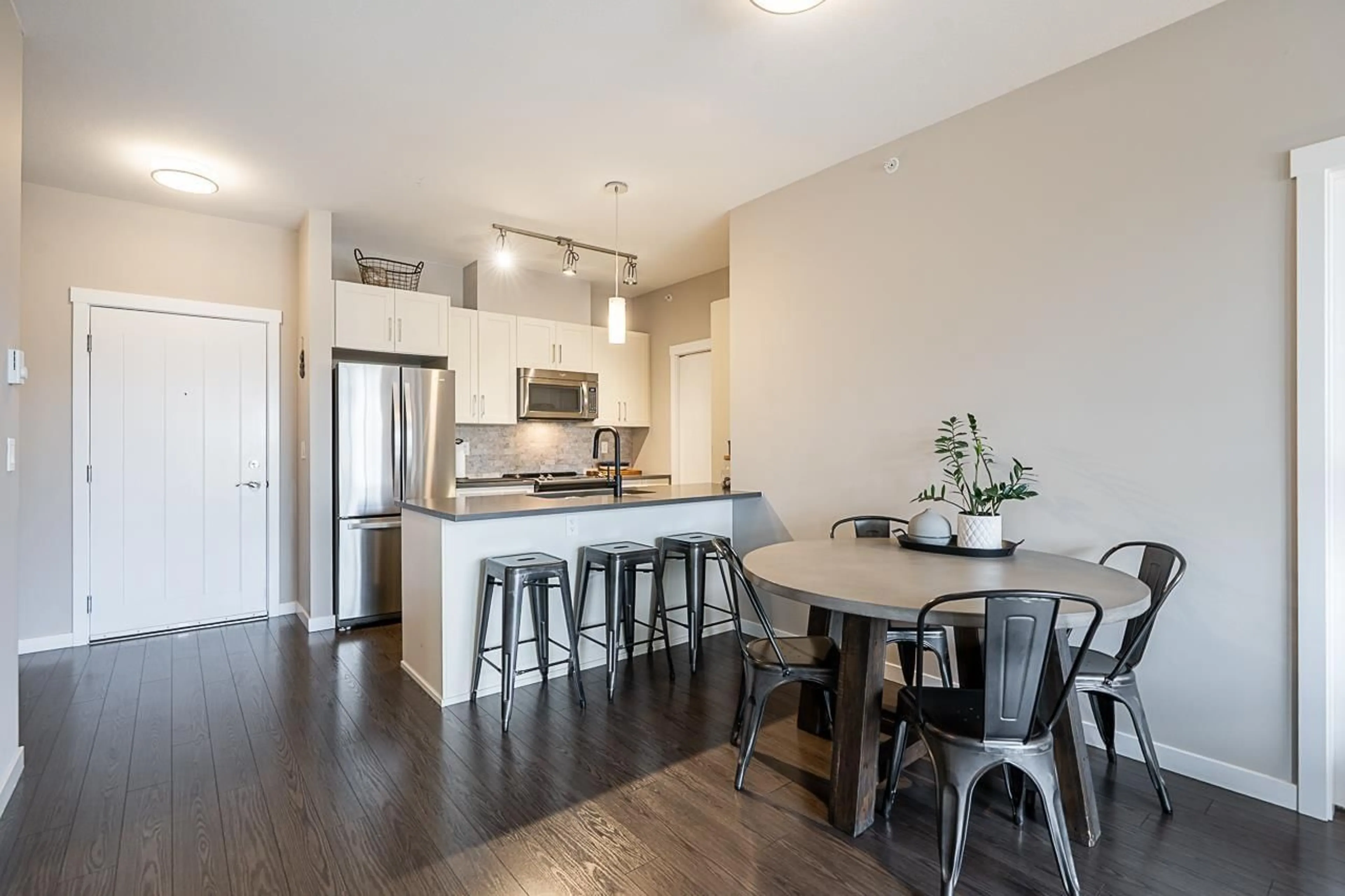 Open concept kitchen, wood/laminate floor for 306 - 2855 156, Surrey British Columbia V3Z3Y3