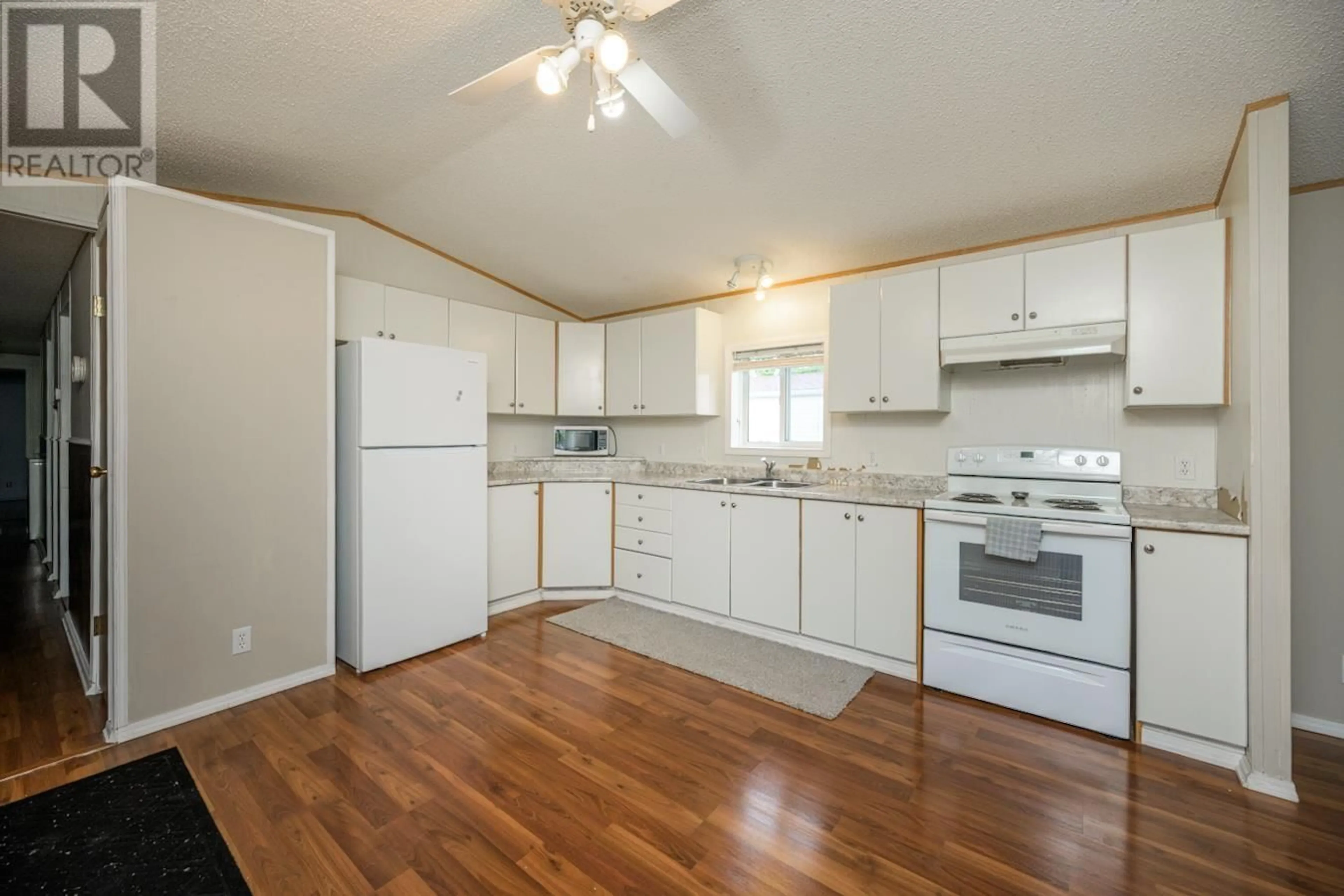 Standard kitchen, wood/laminate floor for 61 - 7100 ALDEEN ROAD, Prince George British Columbia V2N5R5