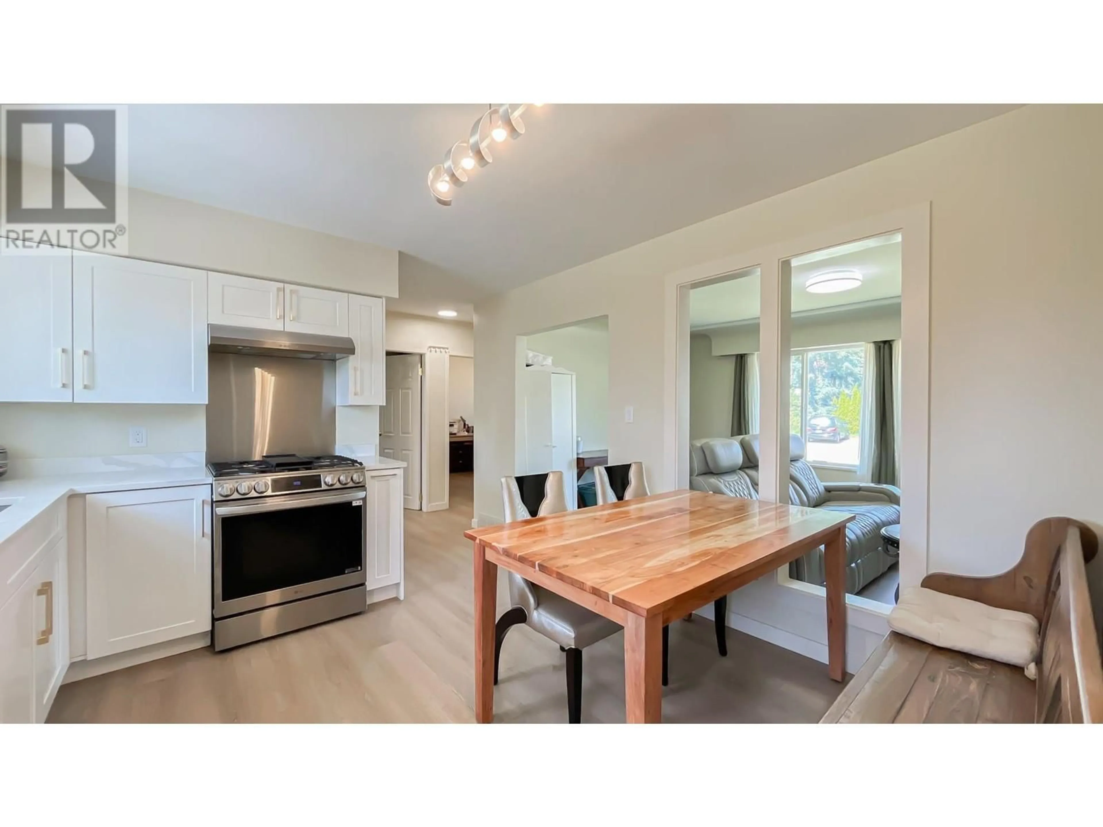 Open concept kitchen, wood/laminate floor for 1752 DORSET AVENUE, Port Coquitlam British Columbia V3B2A2