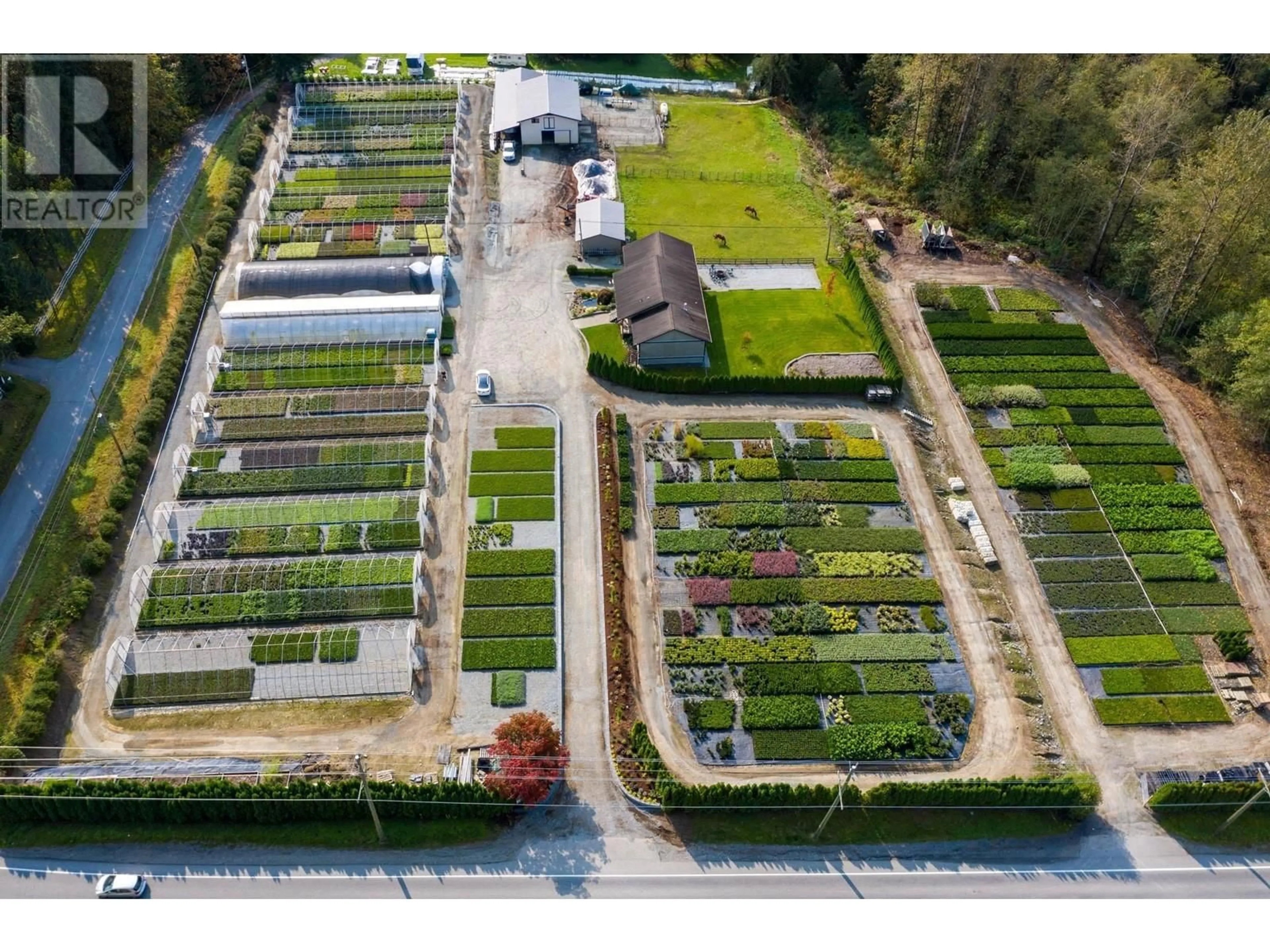 A pic from outside/outdoor area/front of a property/back of a property/a pic from drone, street for 26362 DEWDNEY TRUNK ROAD, Maple Ridge British Columbia V2W1A1