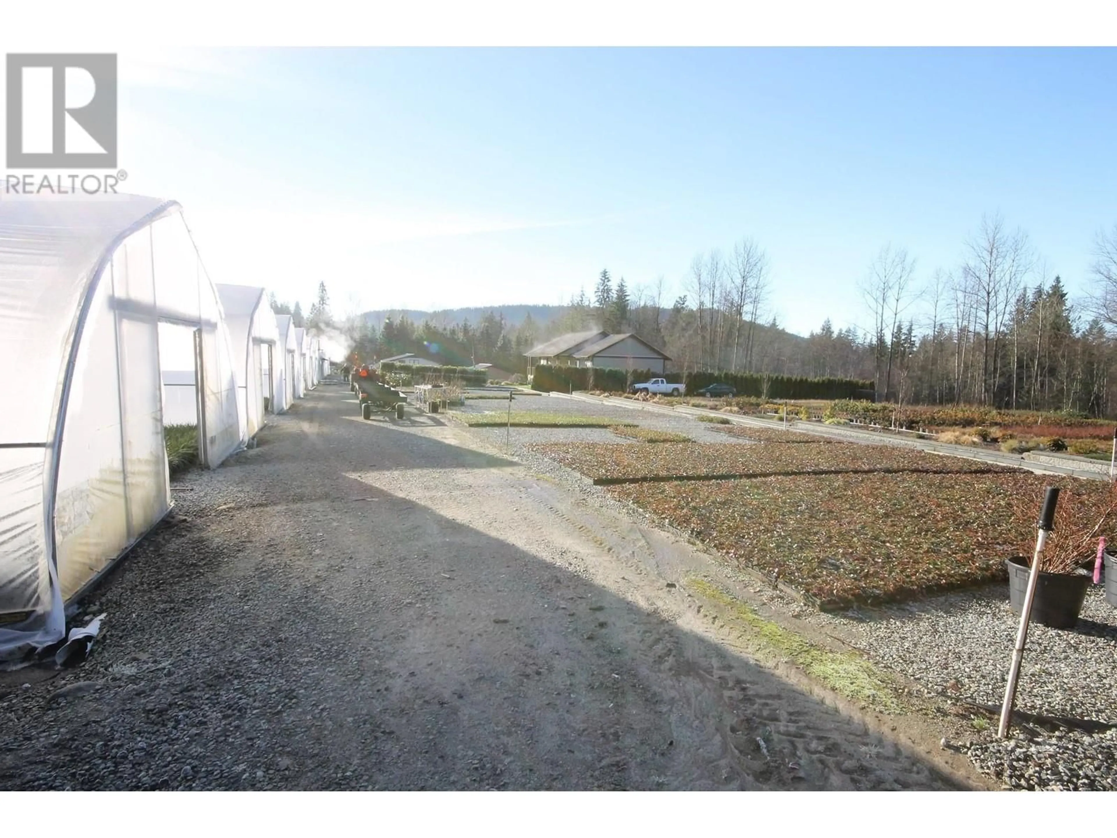 A pic from outside/outdoor area/front of a property/back of a property/a pic from drone, street for 26362 DEWDNEY TRUNK ROAD, Maple Ridge British Columbia V2W1A1