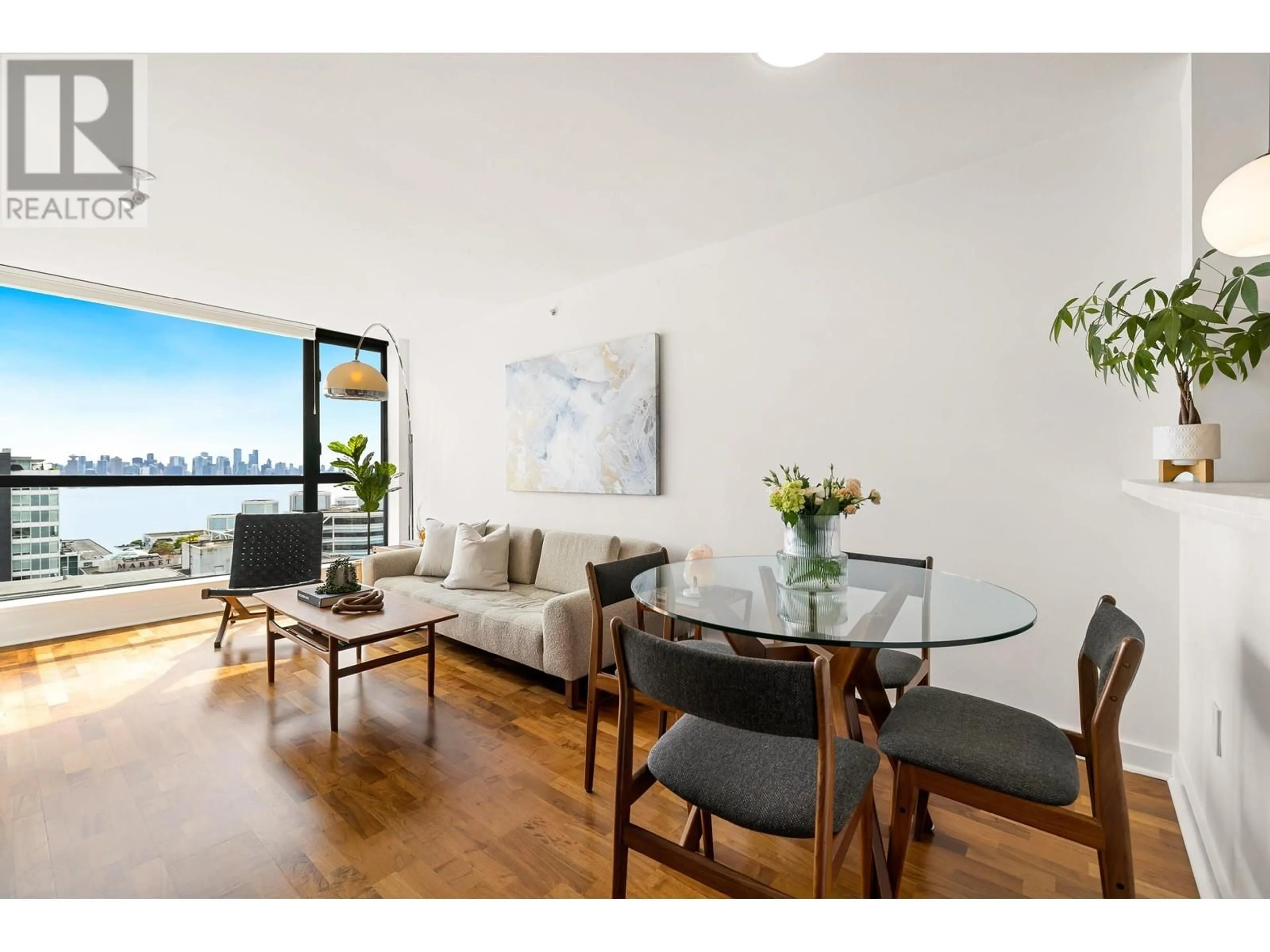 Living room with furniture, wood/laminate floor for 1103 - 124 1ST STREET, North Vancouver British Columbia V7M3N3