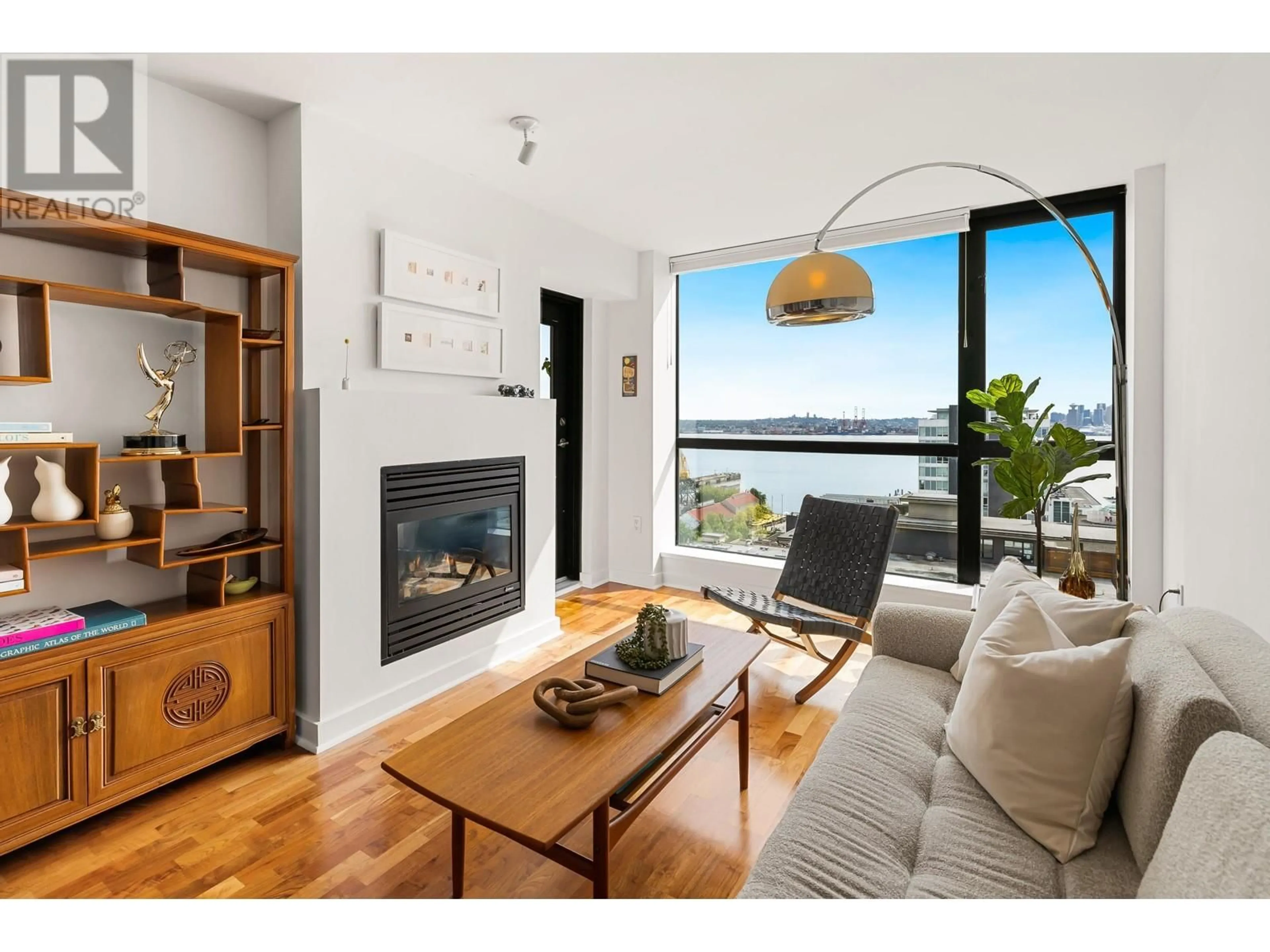 Living room with furniture, wood/laminate floor for 1103 - 124 1ST STREET, North Vancouver British Columbia V7M3N3