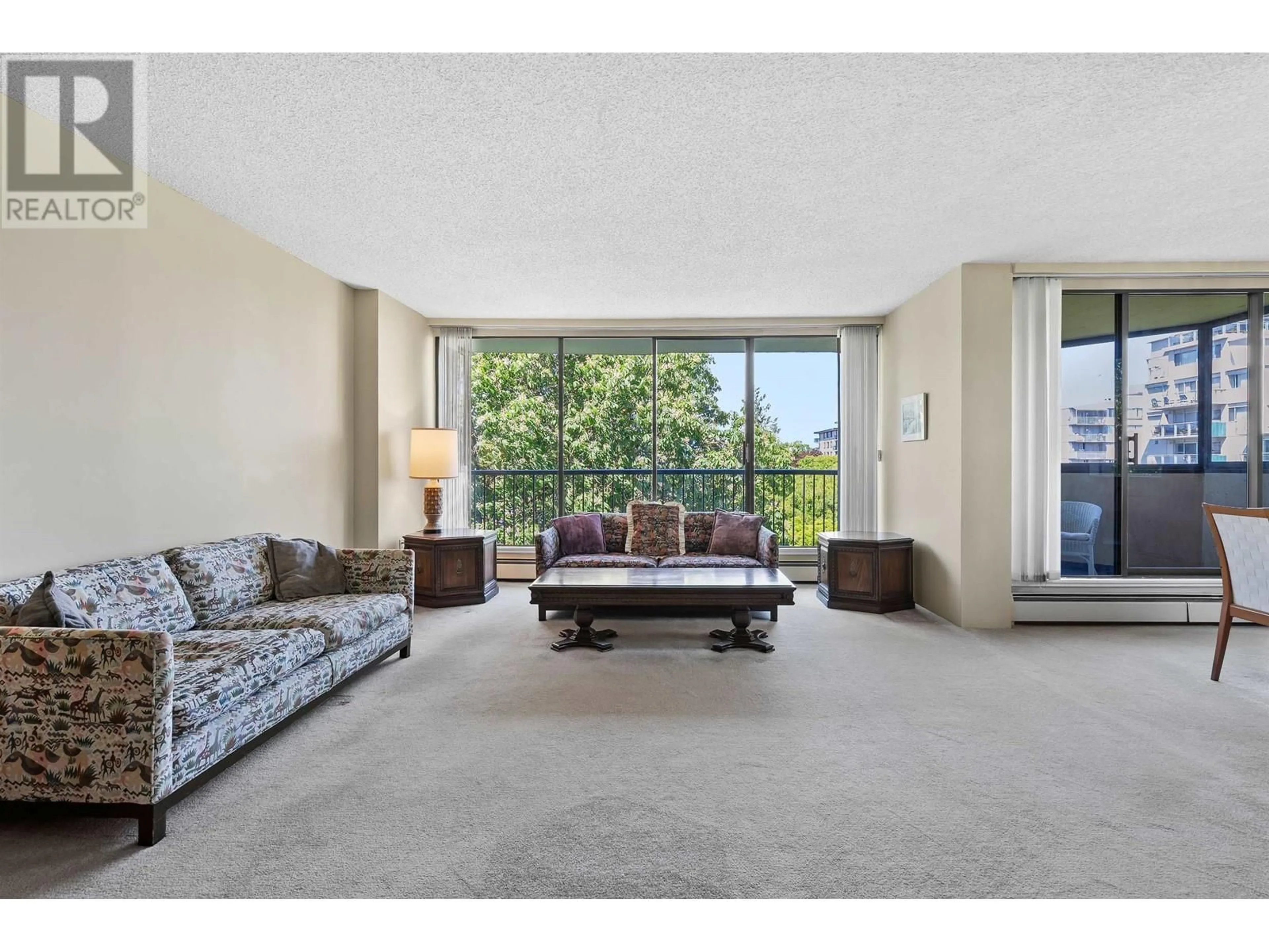 Living room with furniture, unknown for 601 - 5555 YEW STREET, Vancouver British Columbia V6M3X9