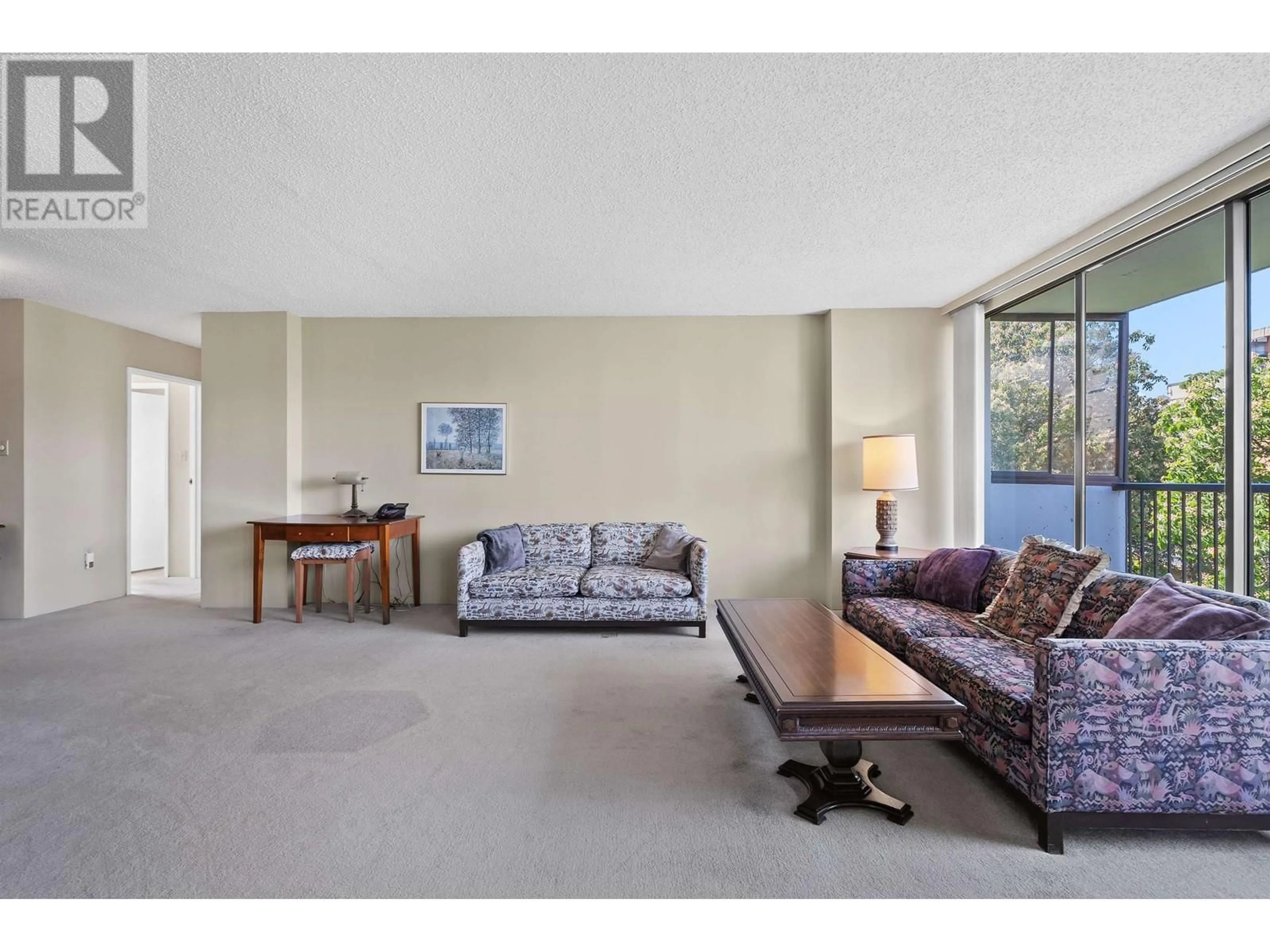 Living room with furniture, unknown for 601 - 5555 YEW STREET, Vancouver British Columbia V6M3X9