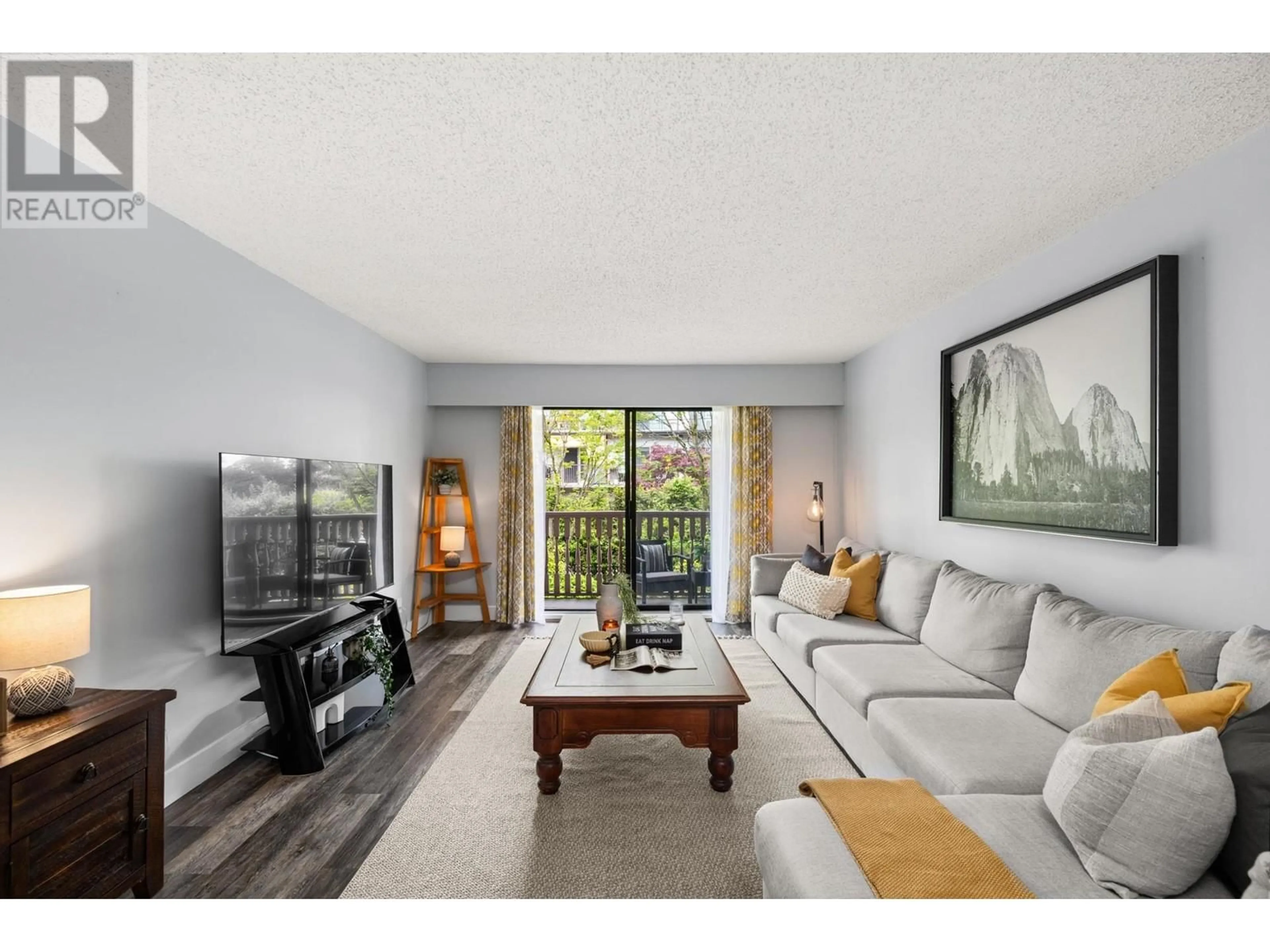 Living room with furniture, unknown for 211 - 236 2ND STREET, North Vancouver British Columbia V7M1C6