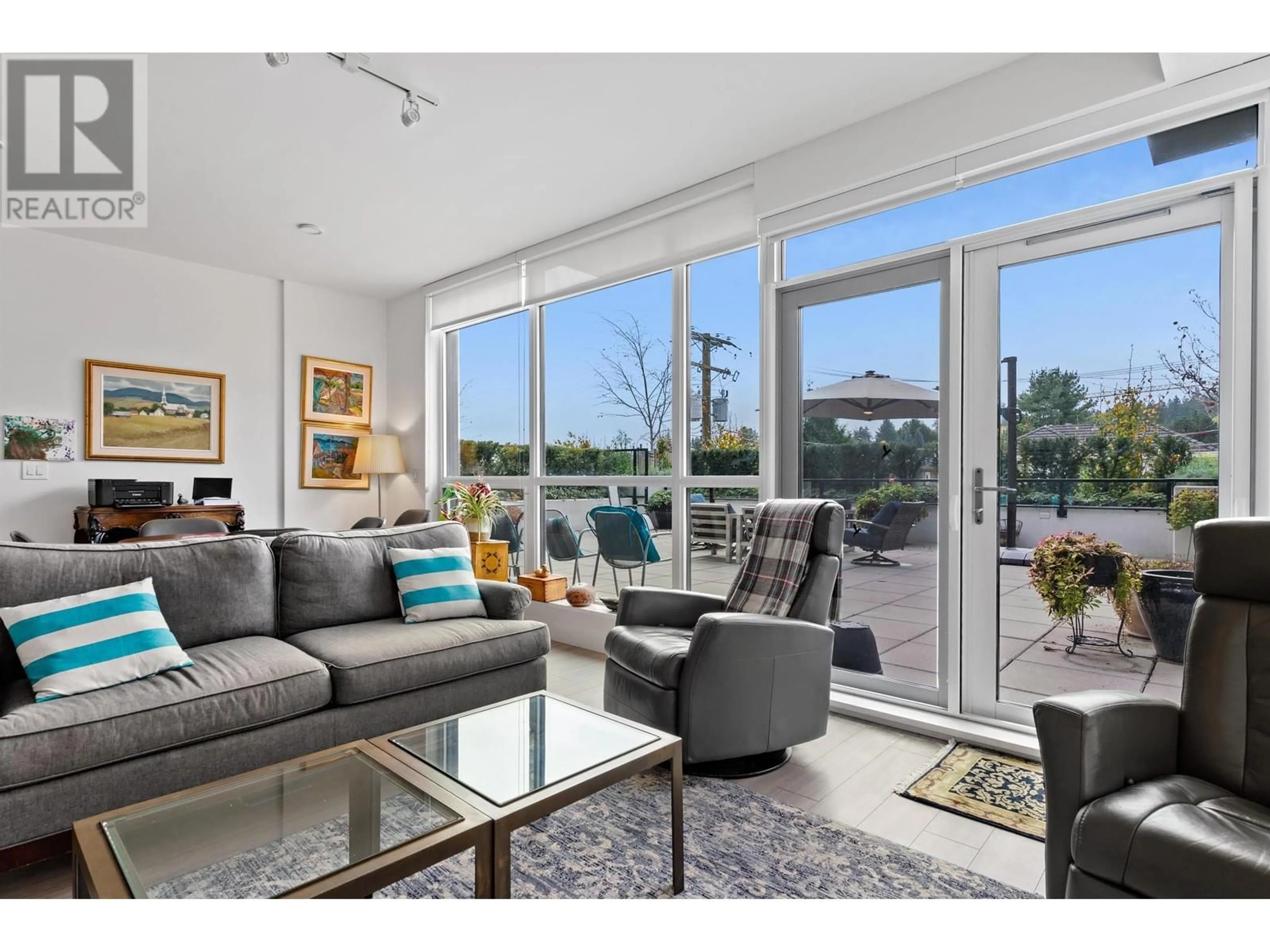 Living room with furniture, unknown for 372 - 438 KING EDWARD AVENUE, Vancouver British Columbia V5Y0M5