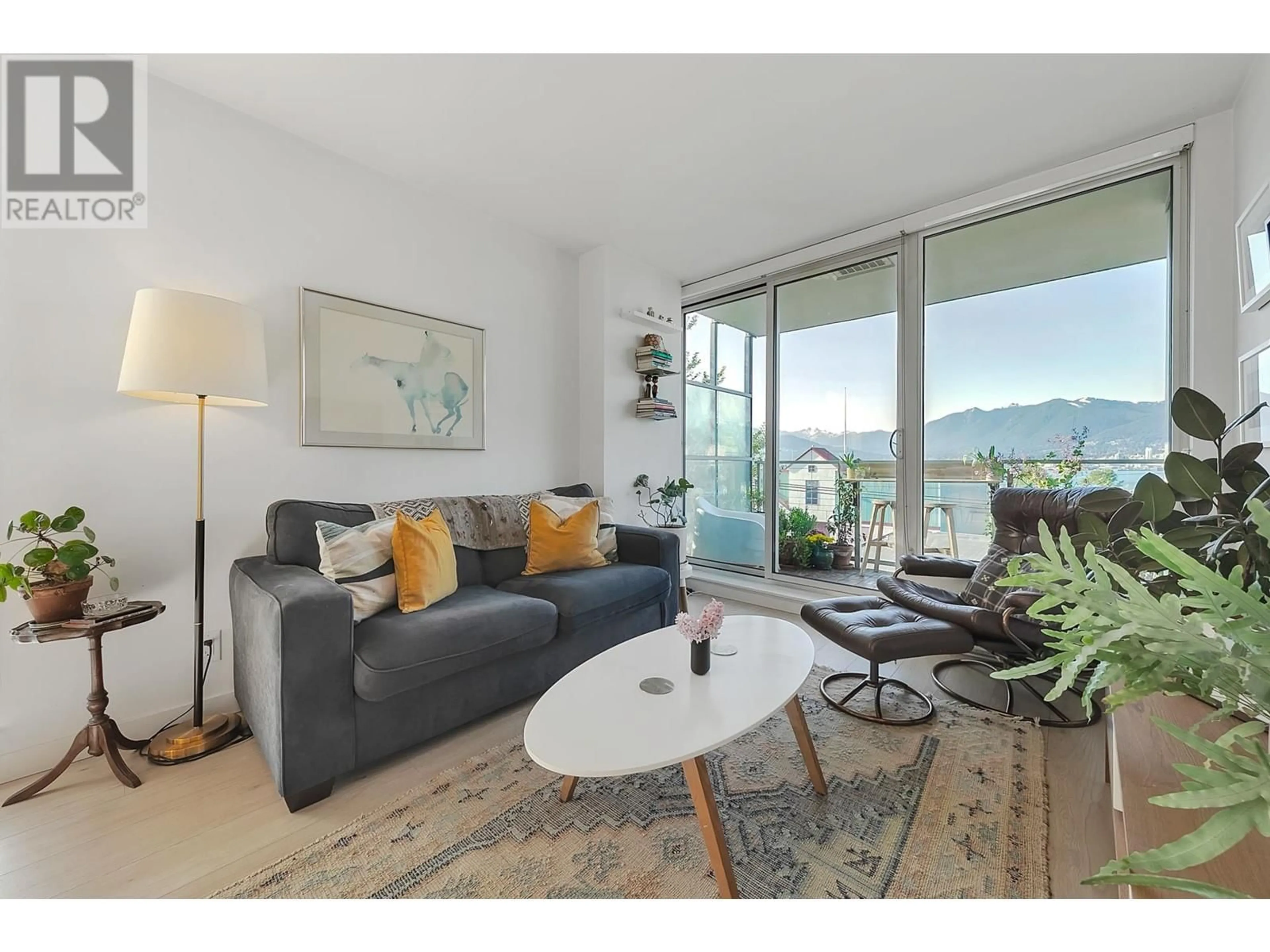 Living room with furniture, wood/laminate floor for 302 - 933 HASTINGS STREET, Vancouver British Columbia V6A0G6