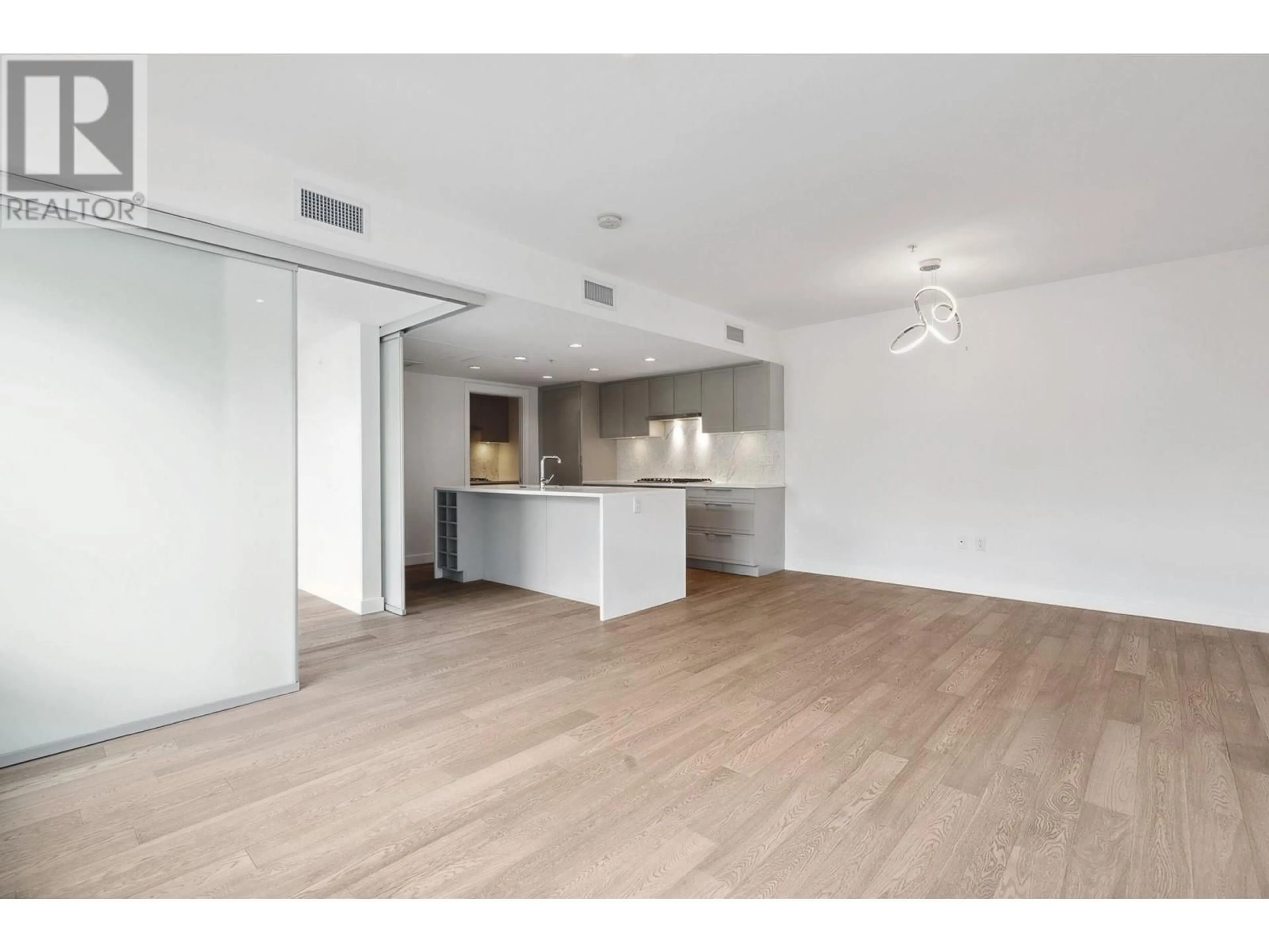 Open concept kitchen, wood/laminate floor for 223 - 7828 GRANVILLE STREET, Vancouver British Columbia V6P4Z2
