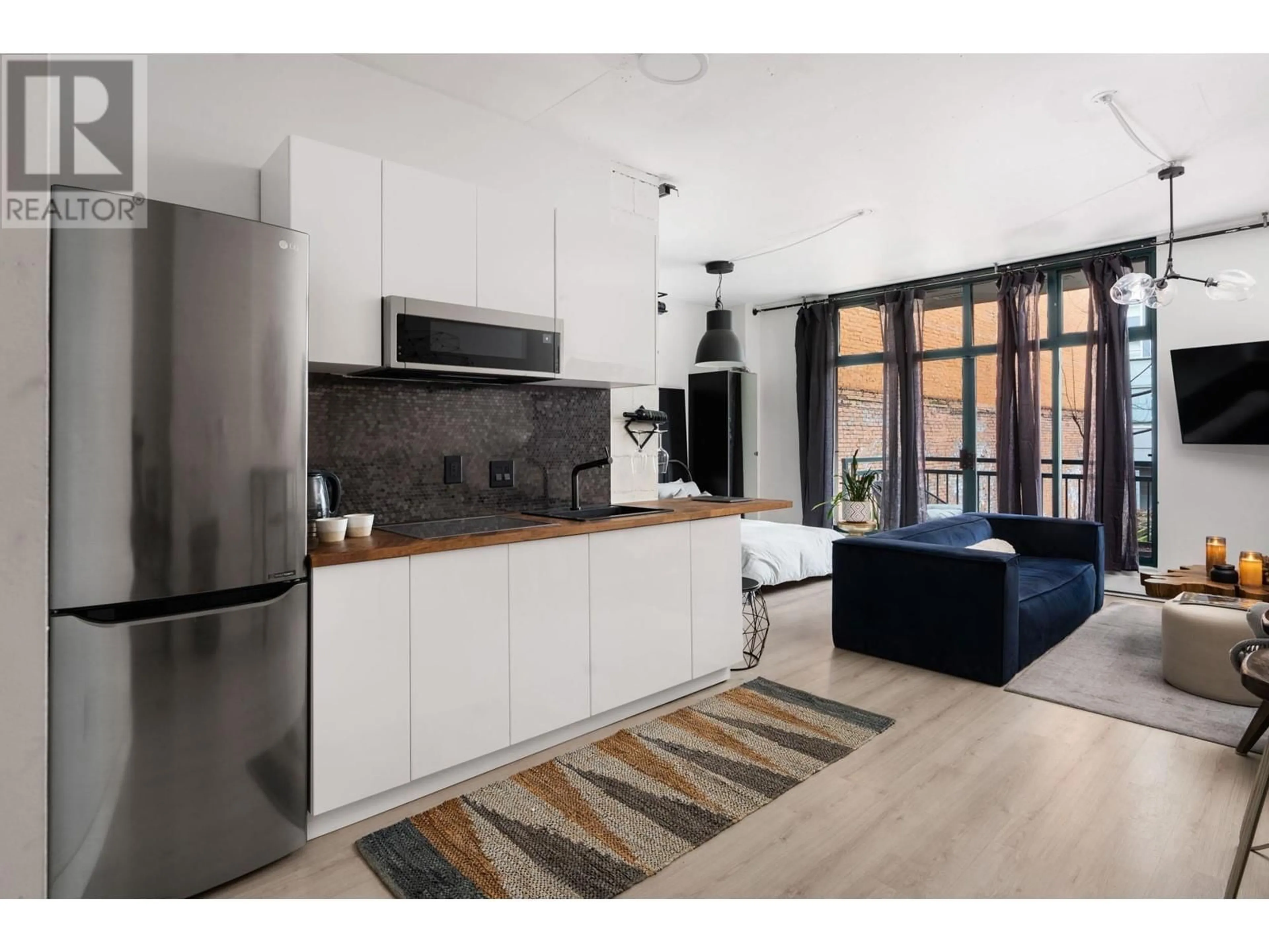 Open concept kitchen, unknown for 212 - 22 CORDOVA STREET, Vancouver British Columbia V6A4G8