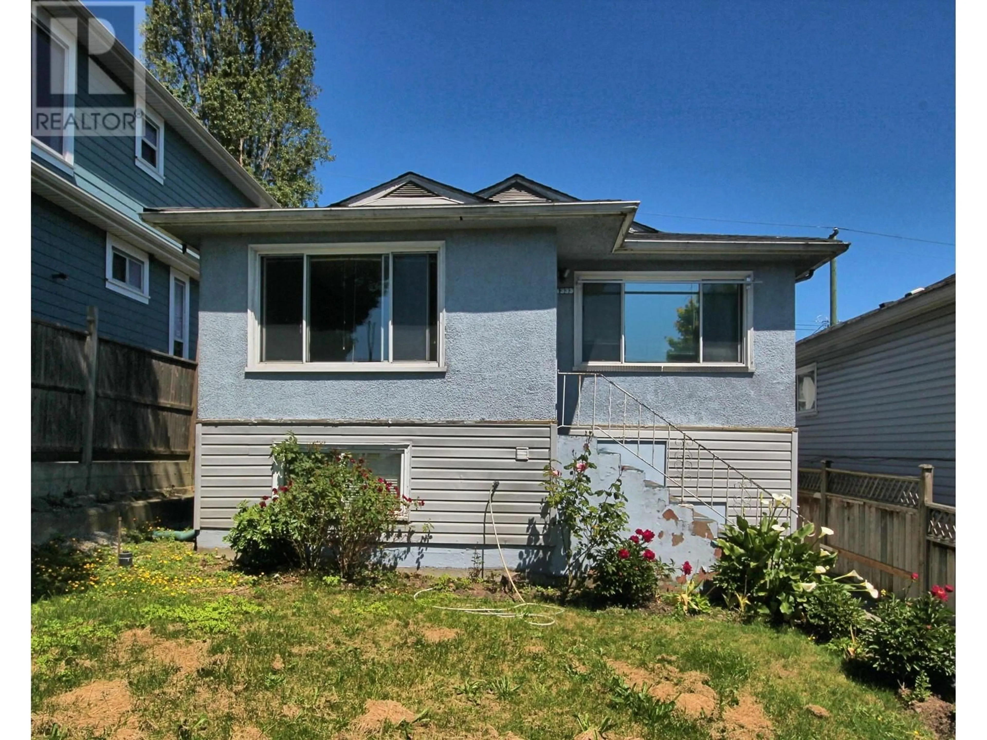 Home with vinyl exterior material, street for 1333 41ST AVENUE, Vancouver British Columbia V5W1R5