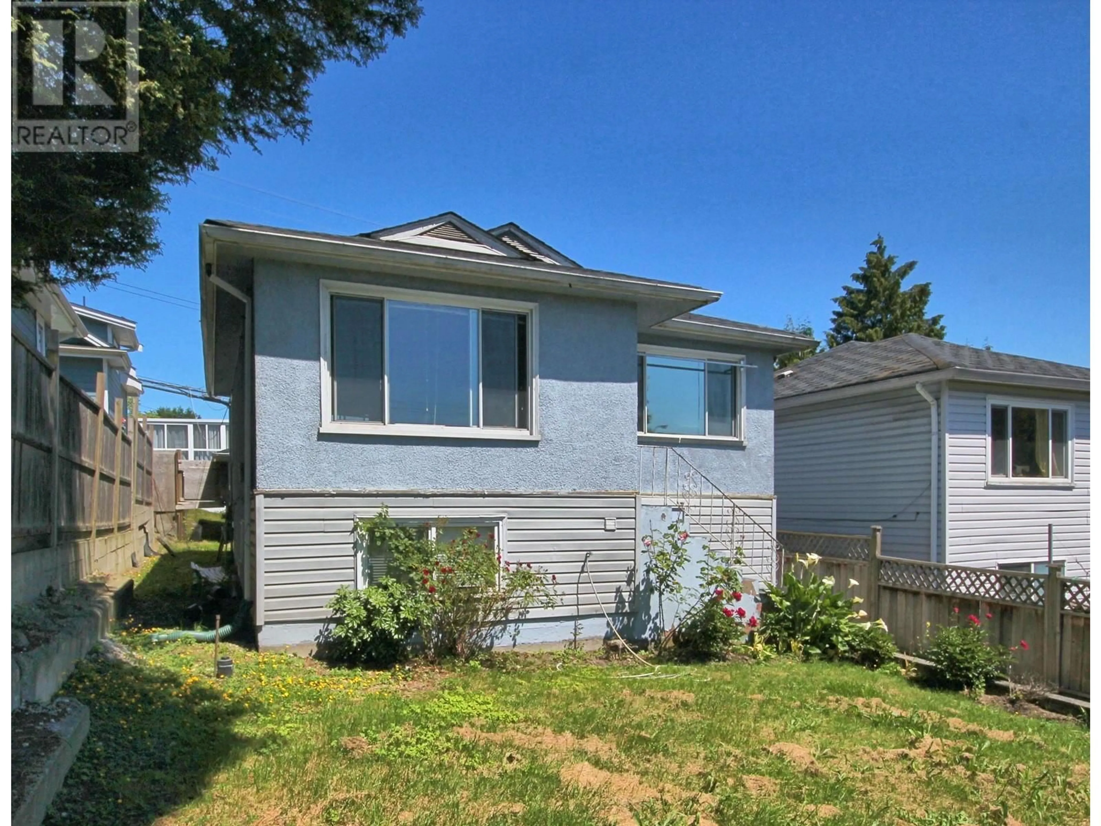Home with vinyl exterior material, street for 1333 41ST AVENUE, Vancouver British Columbia V5W1R5