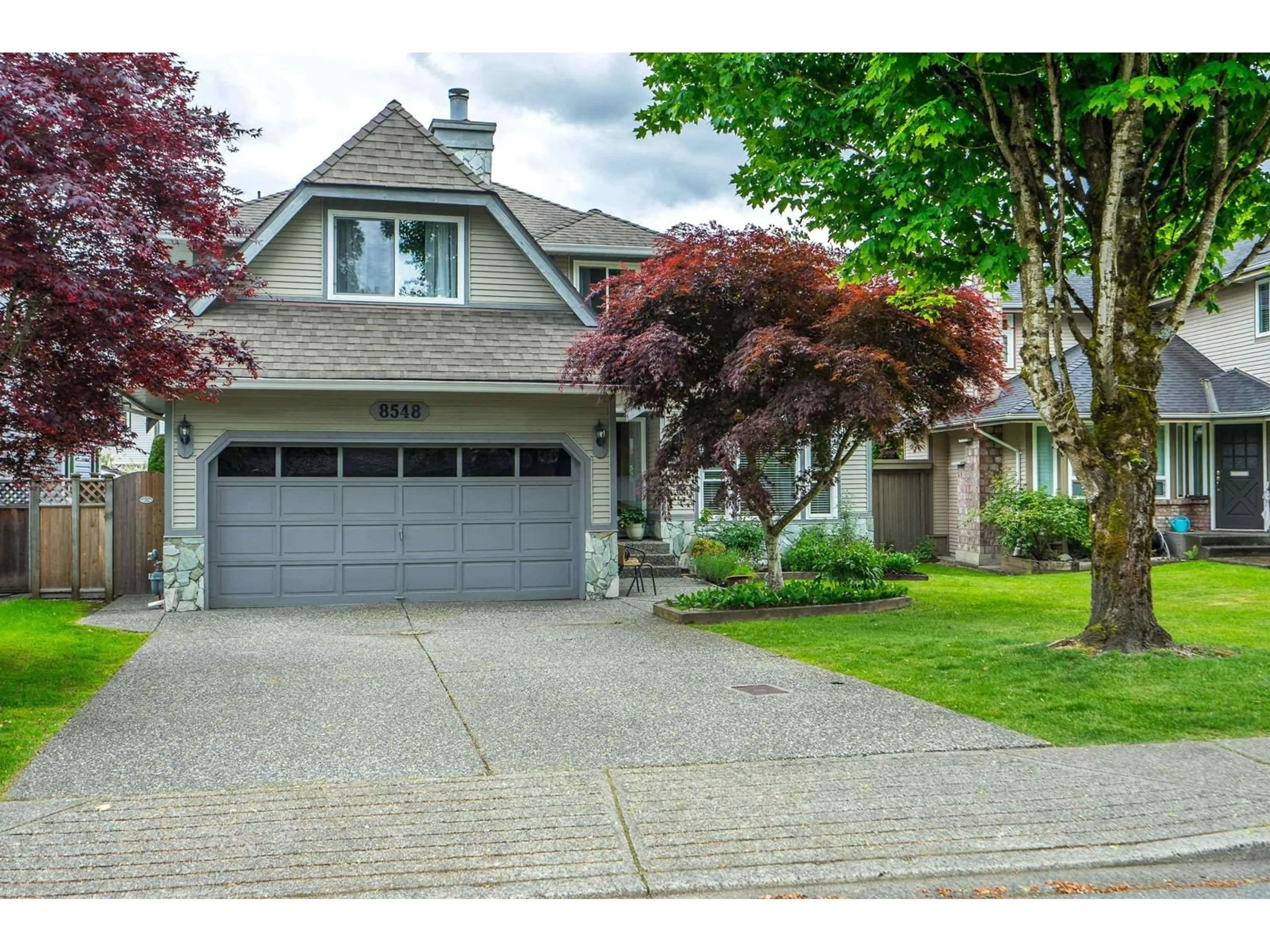 Home with vinyl exterior material, street for 8548 212, Langley British Columbia V1M2E7