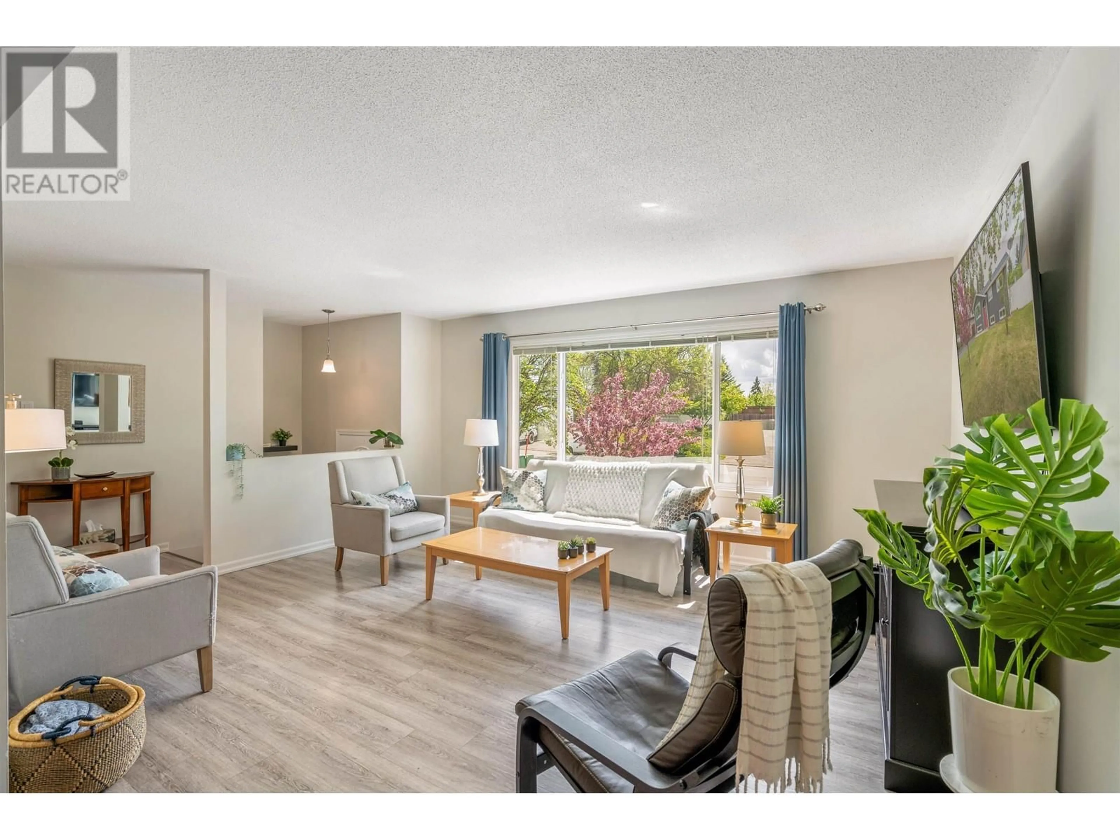 Living room with furniture, wood/laminate floor for 190 MCKINLEY CRESCENT, Prince George British Columbia V2M4S4