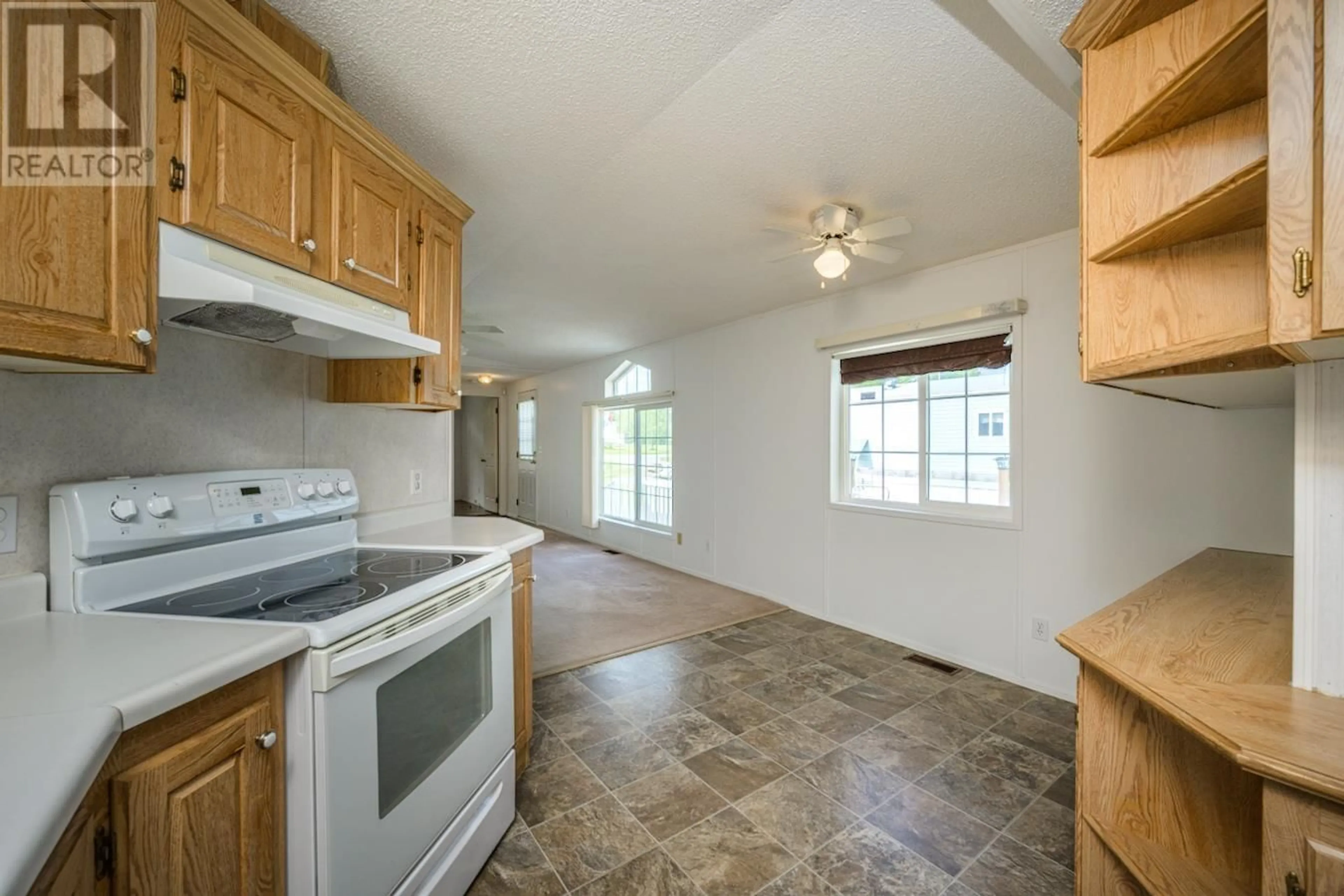 Standard kitchen, ceramic/tile floor for 7574 GISCOME ROAD, Prince George British Columbia V2N6V1