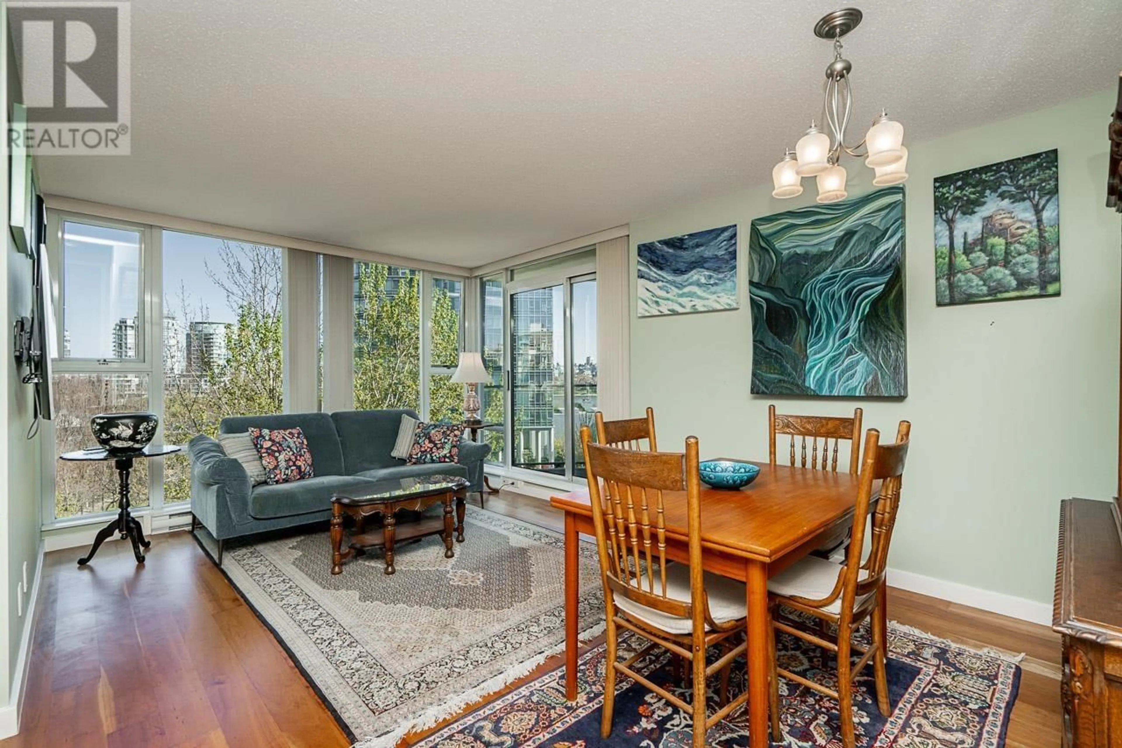 Living room with furniture, wood/laminate floor for 601 - 455 BEACH CRESCENT, Vancouver British Columbia V6Z3E5