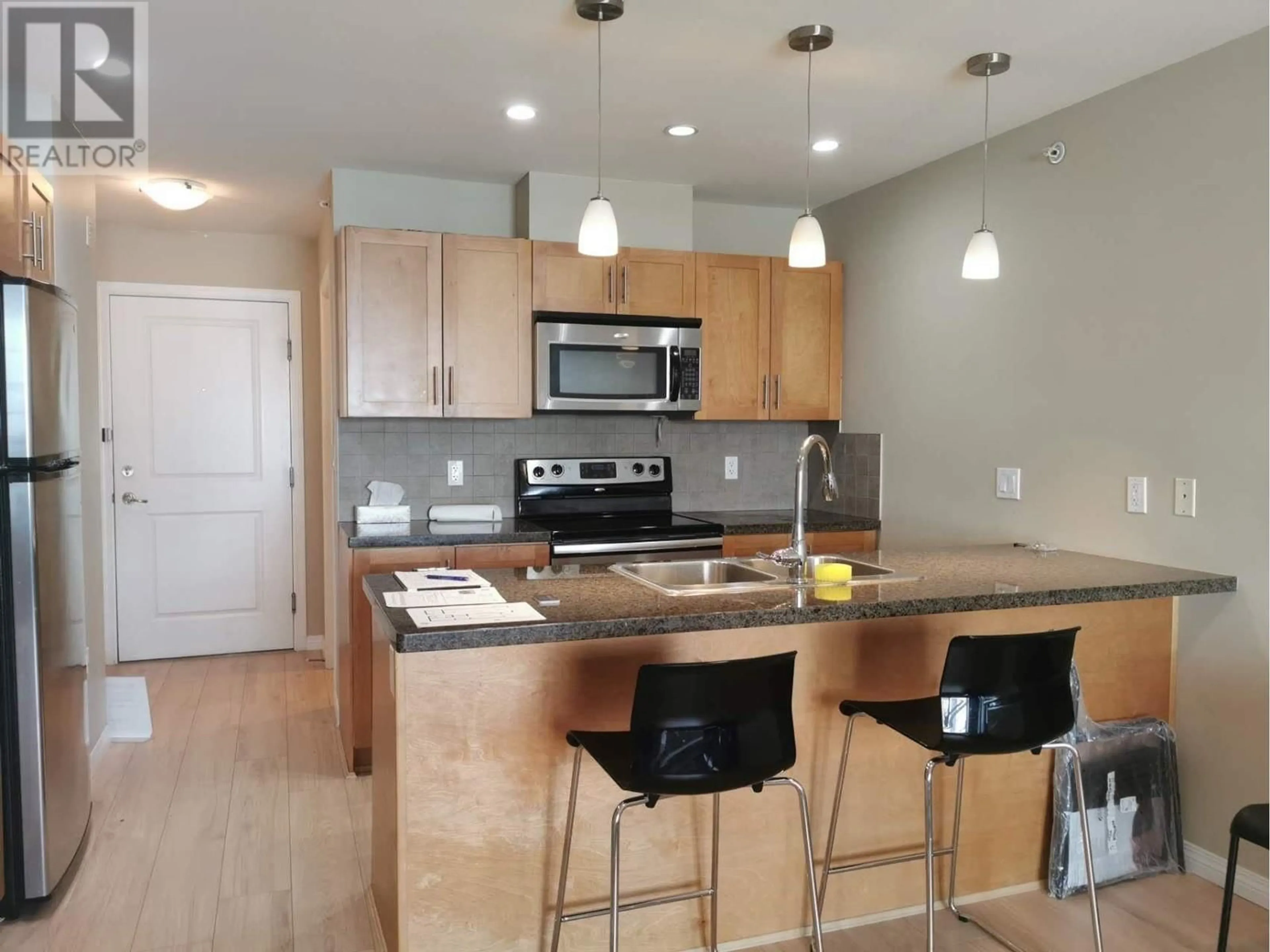 Open concept kitchen, wood/laminate floor for 307 - 5000 IMPERIAL STREET, Burnaby British Columbia V5J1C8