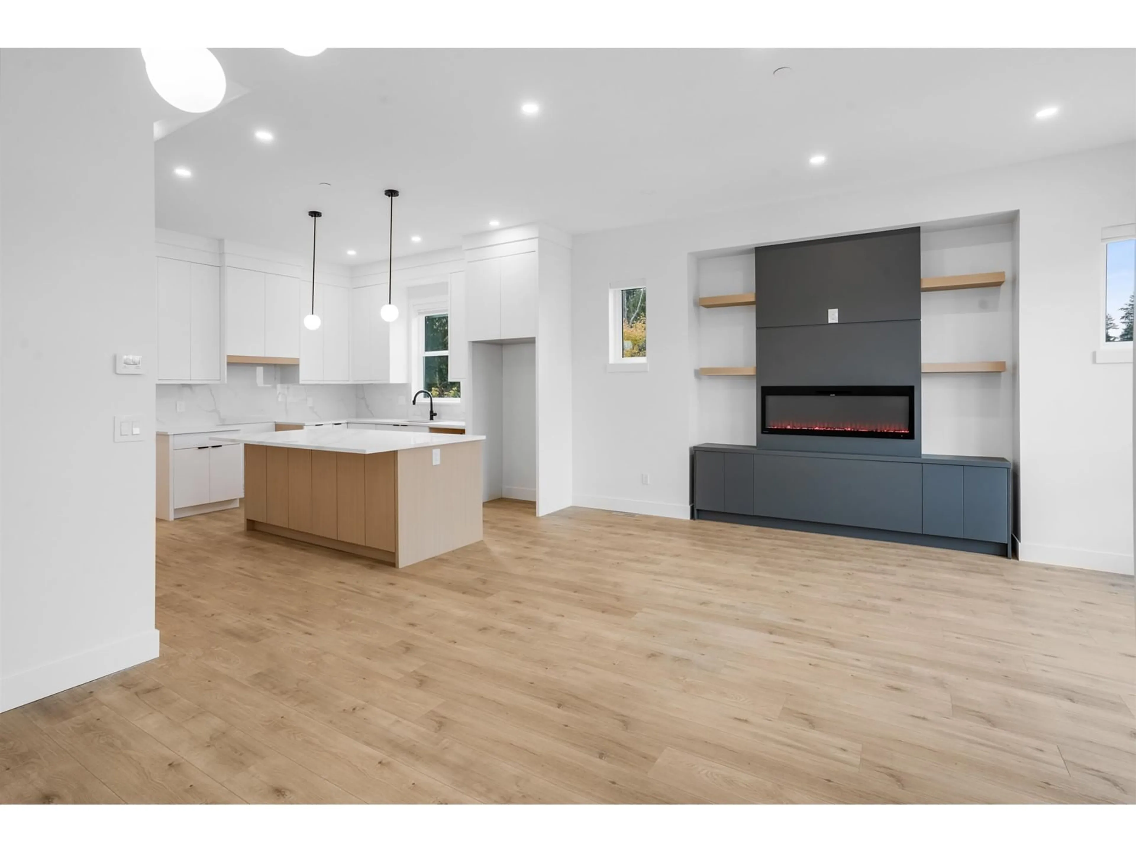 Open concept kitchen, wood/laminate floor for 20483 74B, Langley British Columbia V2Y3S8