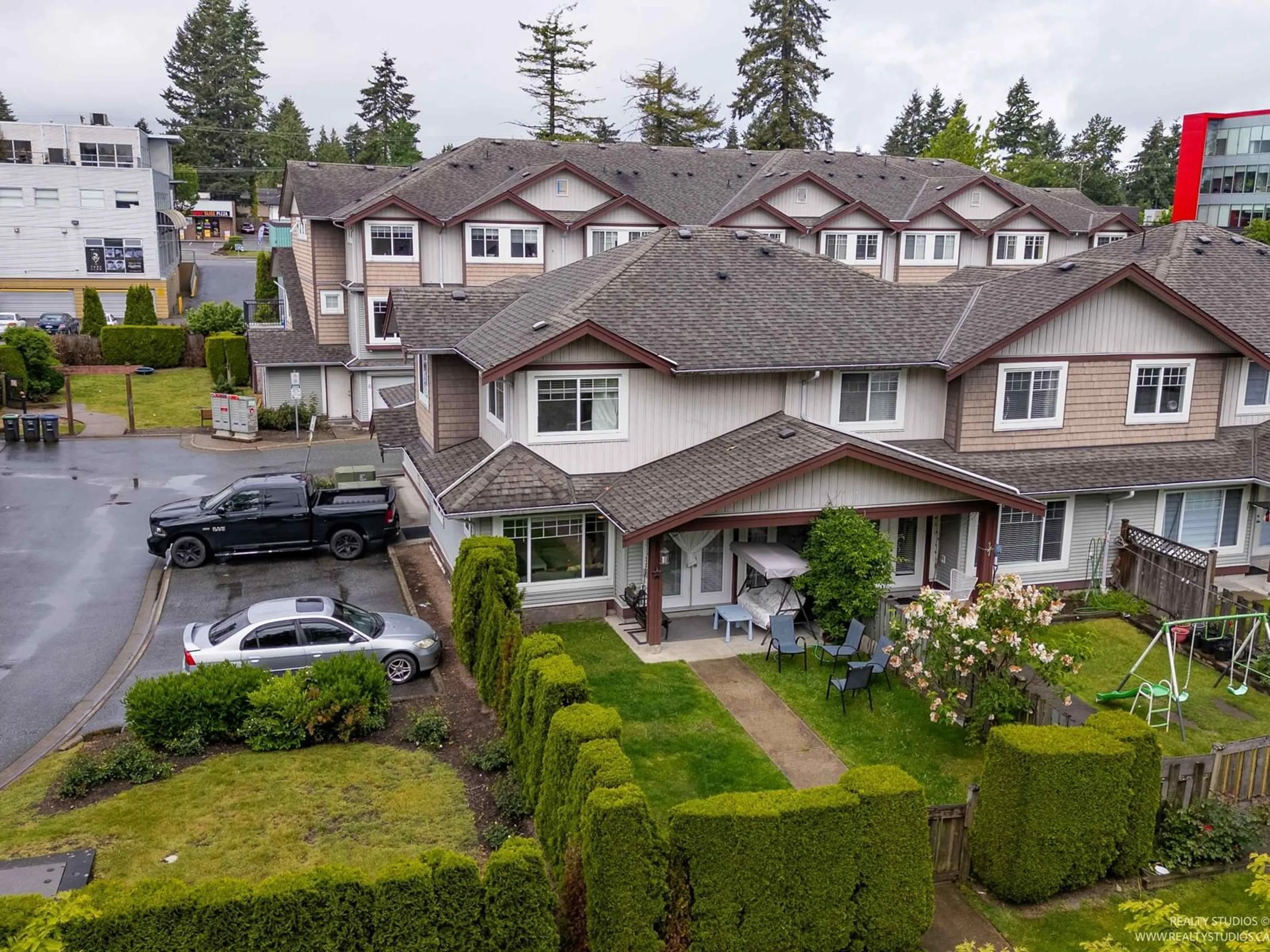 A pic from outside/outdoor area/front of a property/back of a property/a pic from drone, street for 18 - 8255 120A, Surrey British Columbia V3W1T2