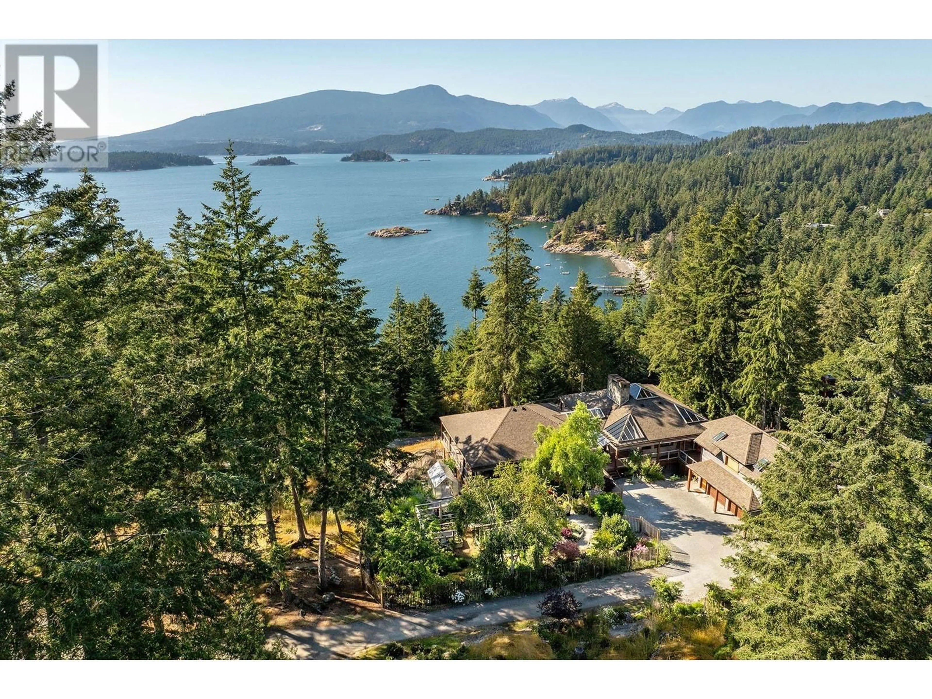 A pic from outside/outdoor area/front of a property/back of a property/a pic from drone, water/lake/river/ocean view for 1675 WHITESAILS DRIVE, Bowen Island British Columbia V0N1G2