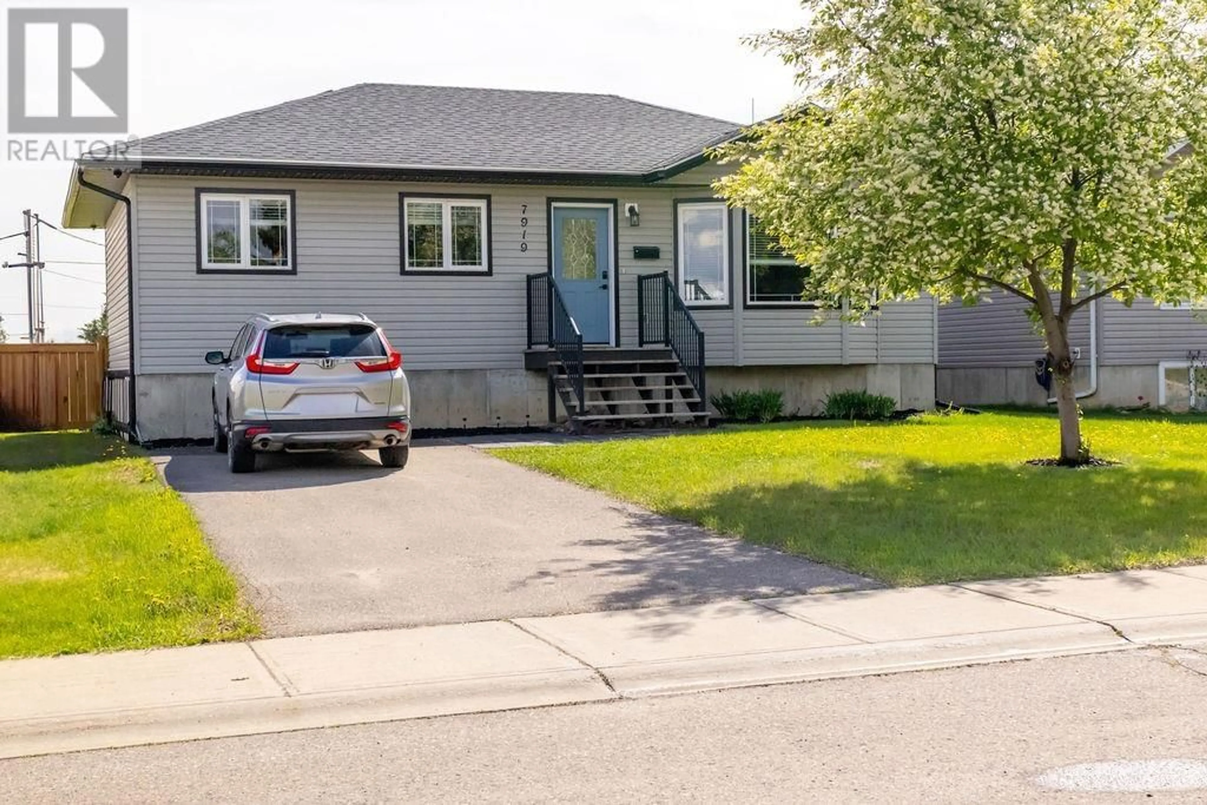 Home with vinyl exterior material, street for 7919 95 AVENUE, Fort St. John British Columbia V1J1G5