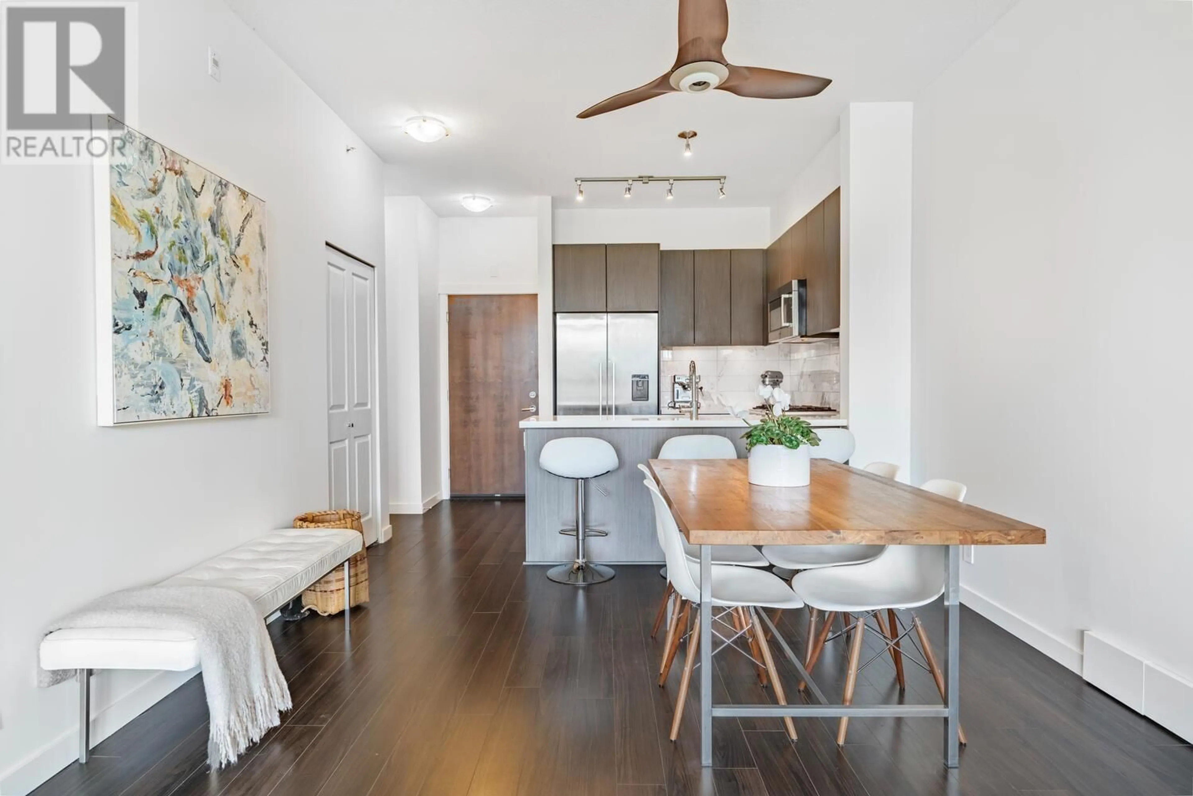 Open concept kitchen, wood/laminate floor for 510 - 3168 RIVERWALK AVENUE, Vancouver British Columbia V5S0B8