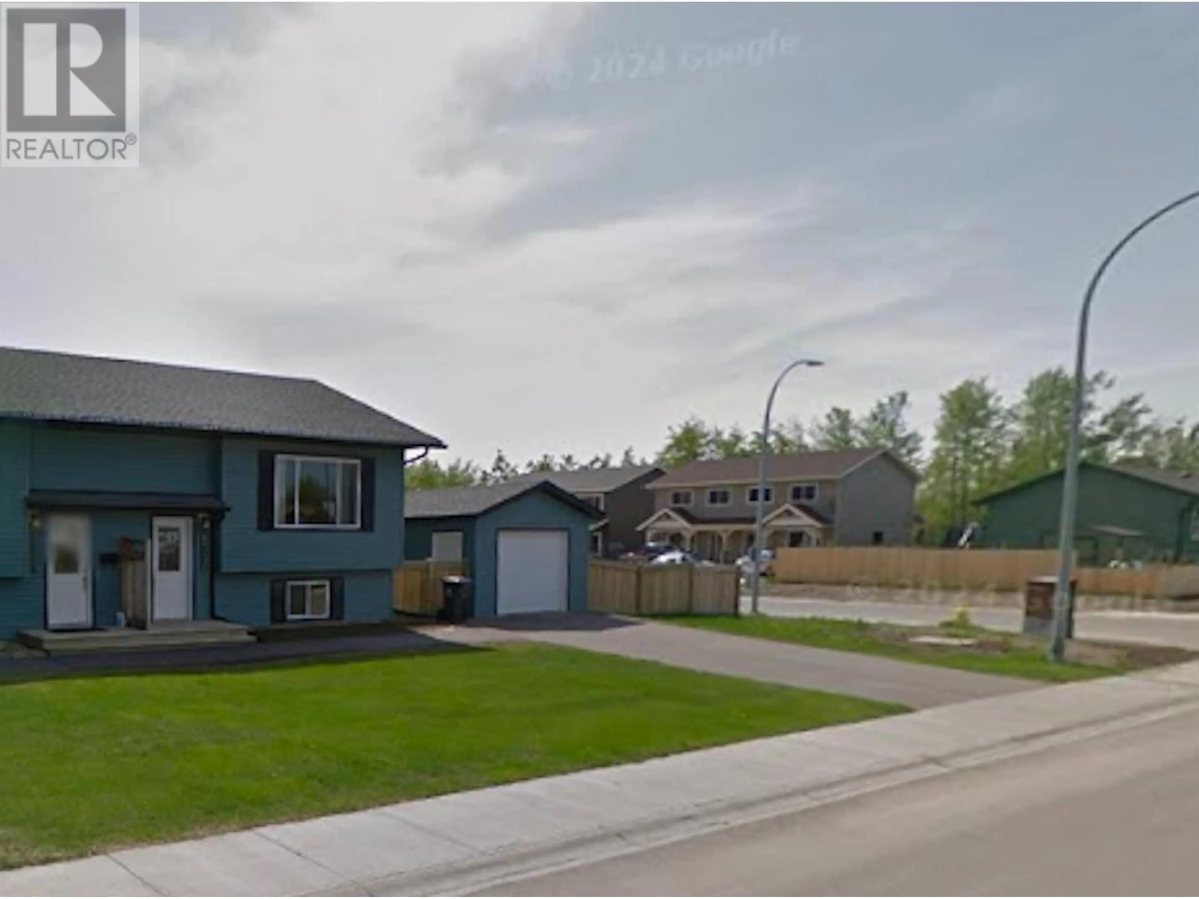 A pic from outside/outdoor area/front of a property/back of a property/a pic from drone, street for 8717 85 AVENUE, Fort St. John British Columbia V1J0E6