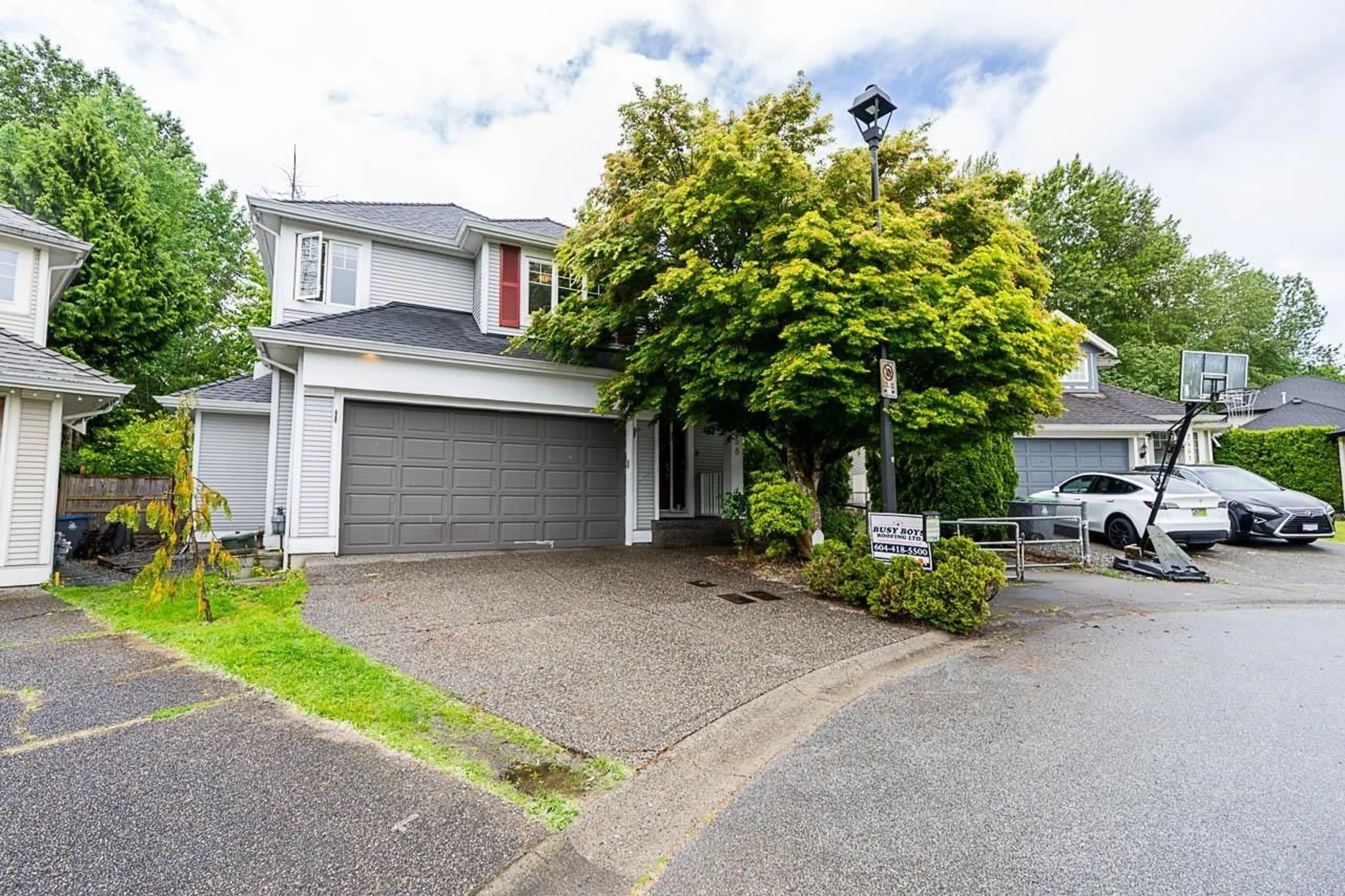 A pic from outside/outdoor area/front of a property/back of a property/a pic from drone, street for 7458 147A, Surrey British Columbia V3S8Y6