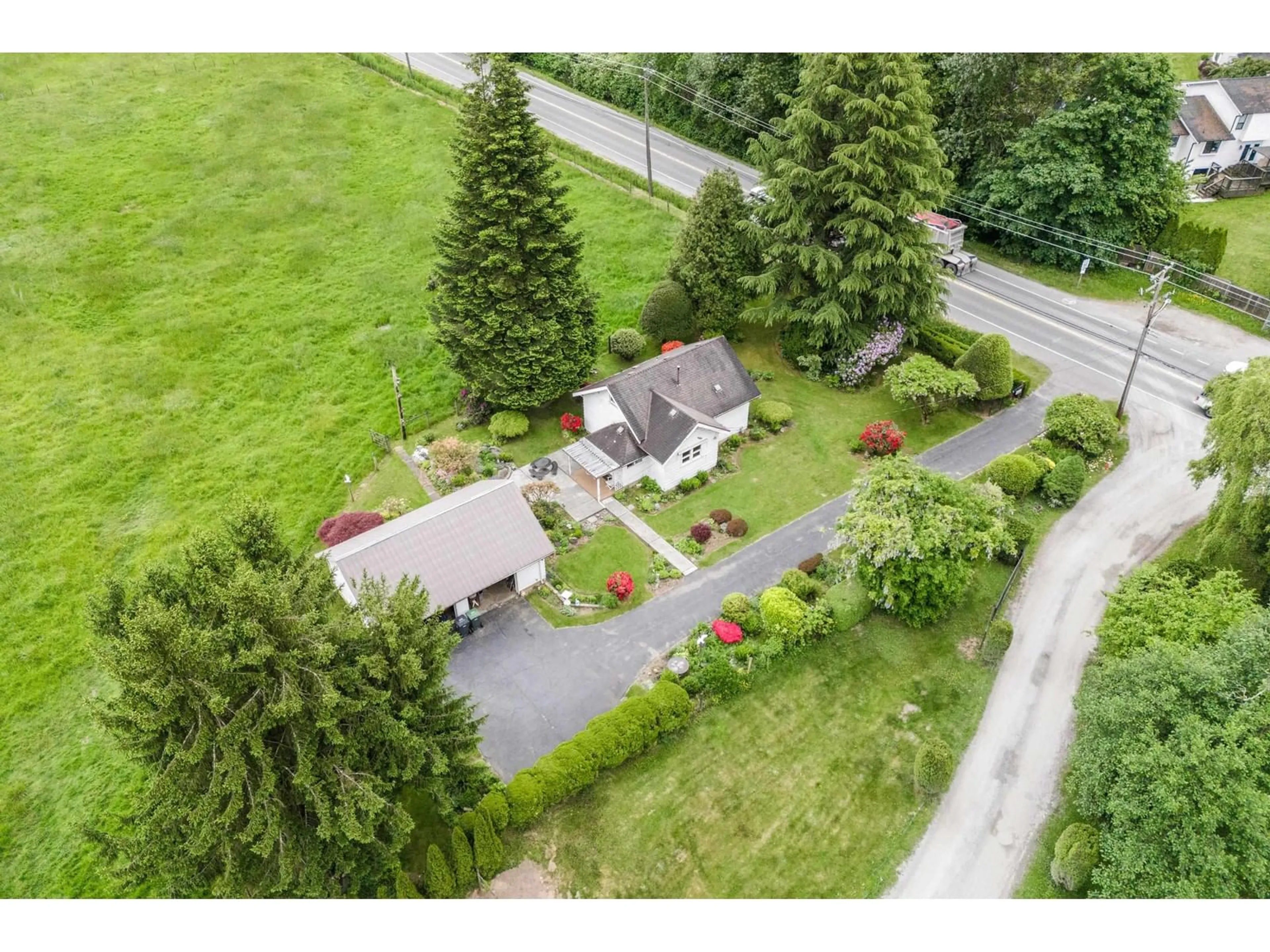 A pic from outside/outdoor area/front of a property/back of a property/a pic from drone, street for 21207 96, Langley British Columbia V1M2Z4