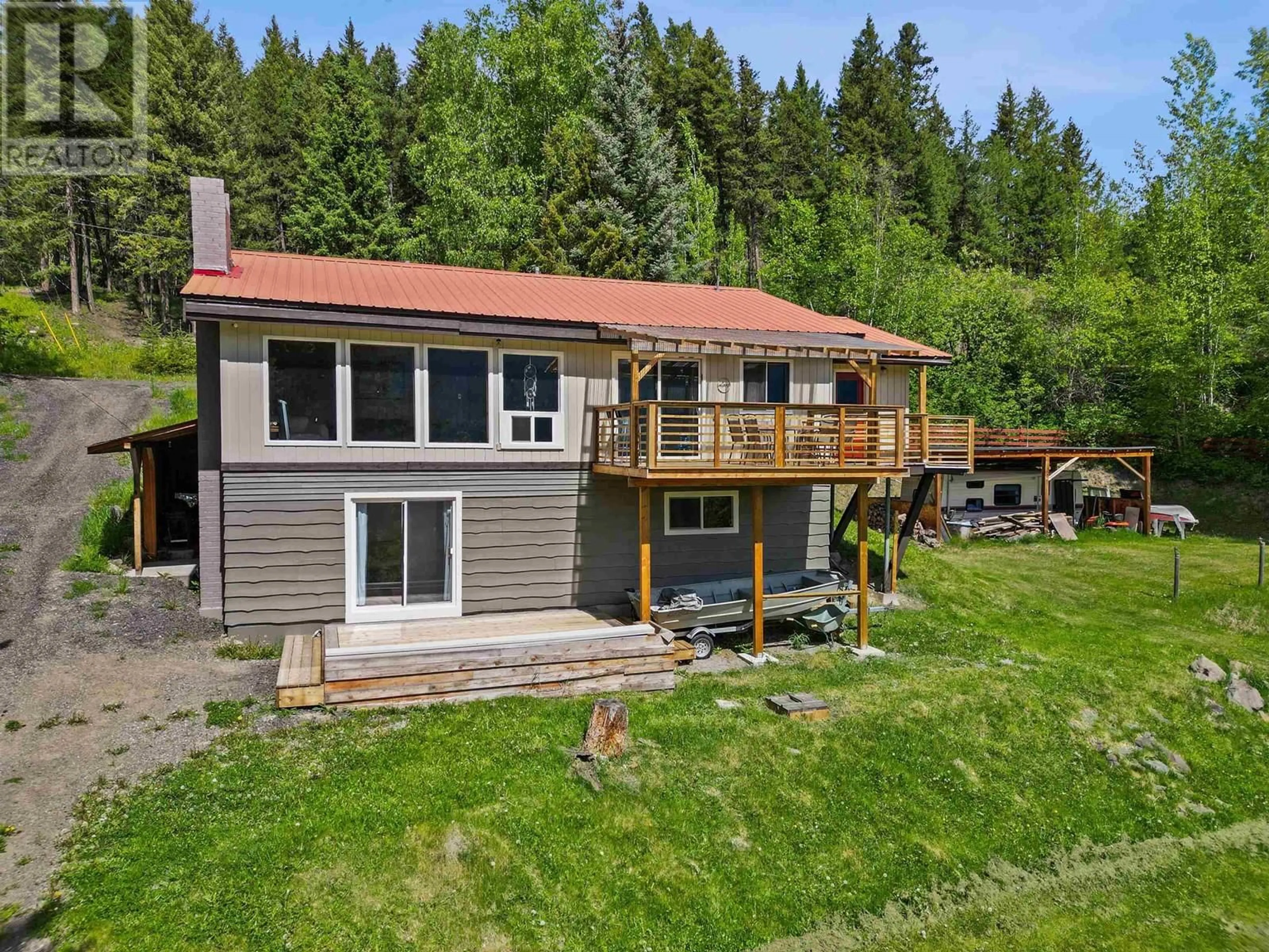 A pic from outside/outdoor area/front of a property/back of a property/a pic from drone, water/lake/river/ocean view for 7267 SUMMIT DRIVE, Canim Lake British Columbia V0K1J0