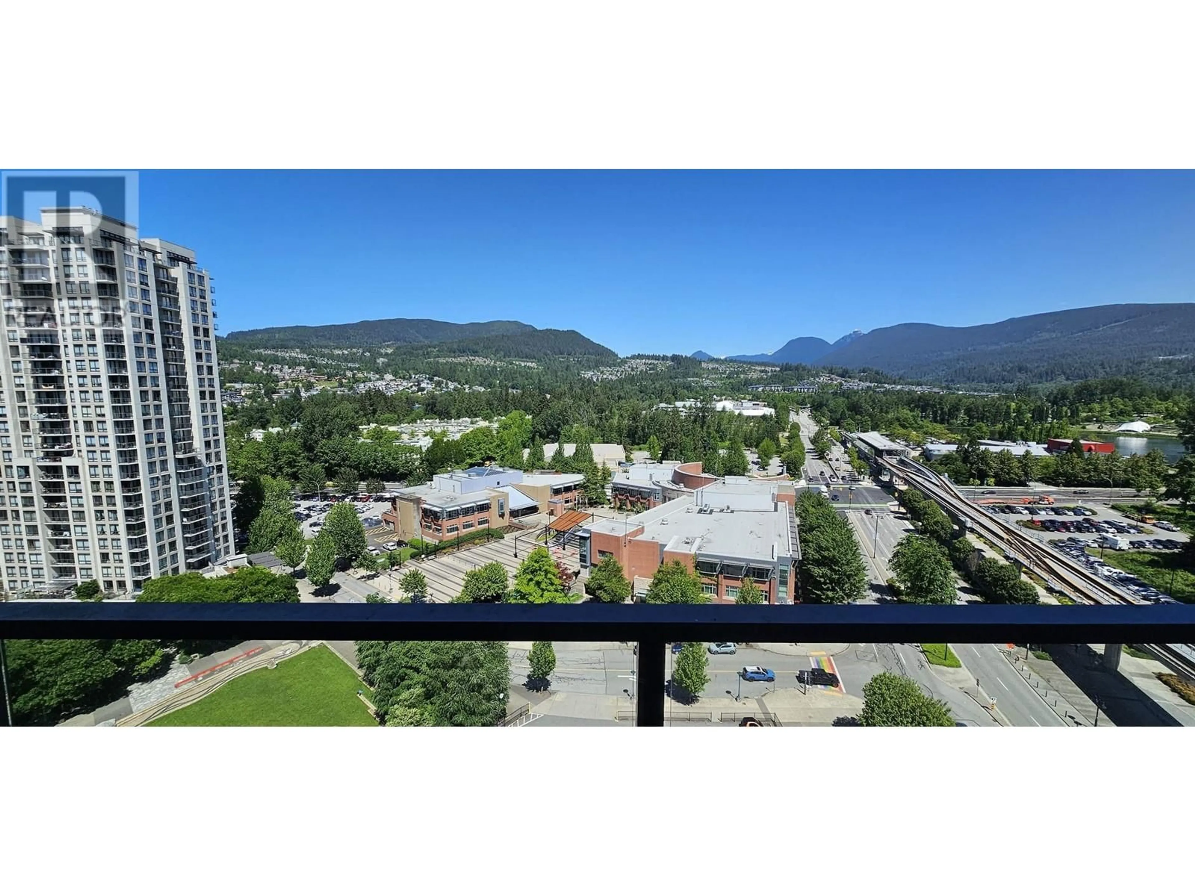 A pic from outside/outdoor area/front of a property/back of a property/a pic from drone, mountain view for 1701 - 3007 GLEN DRIVE, Coquitlam British Columbia V3B0L8