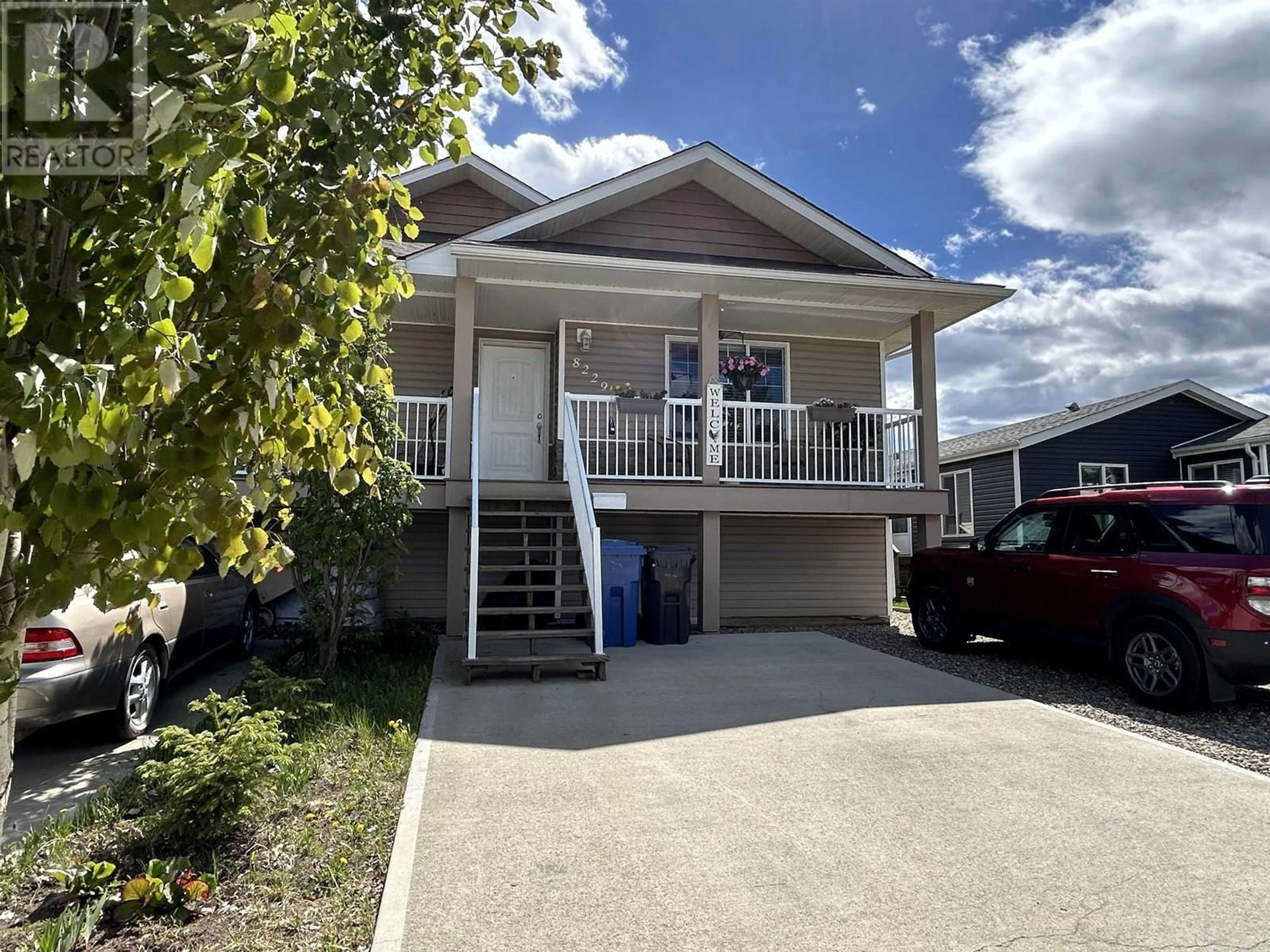 Home with vinyl exterior material, street for 8229 99 AVENUE, Fort St. John British Columbia V1J1S8