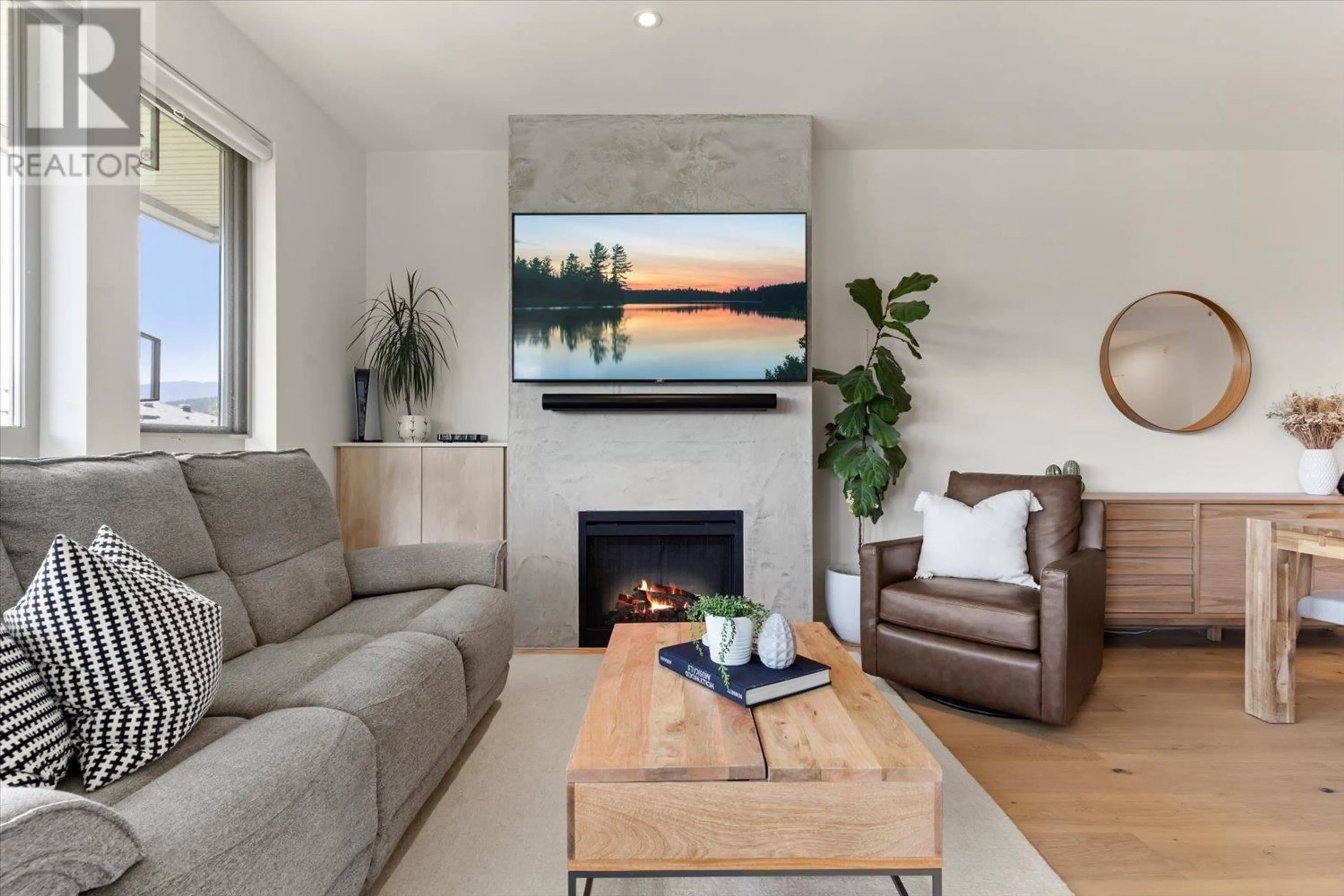 Living room with furniture, wood/laminate floor for 418 - 801 KLAHANIE DRIVE, Port Moody British Columbia V3H5K4