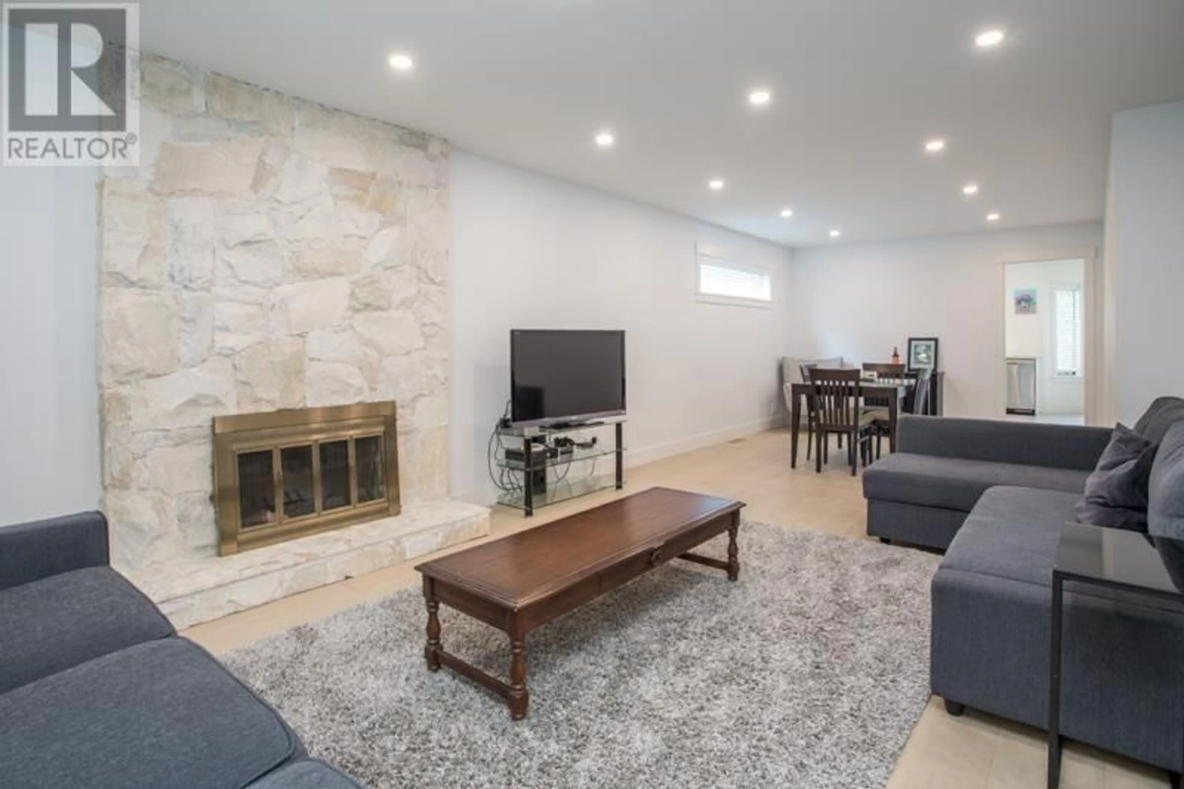 Living room with furniture, ceramic/tile floor for 10113 LAWSON DRIVE, Richmond British Columbia V7E5M2