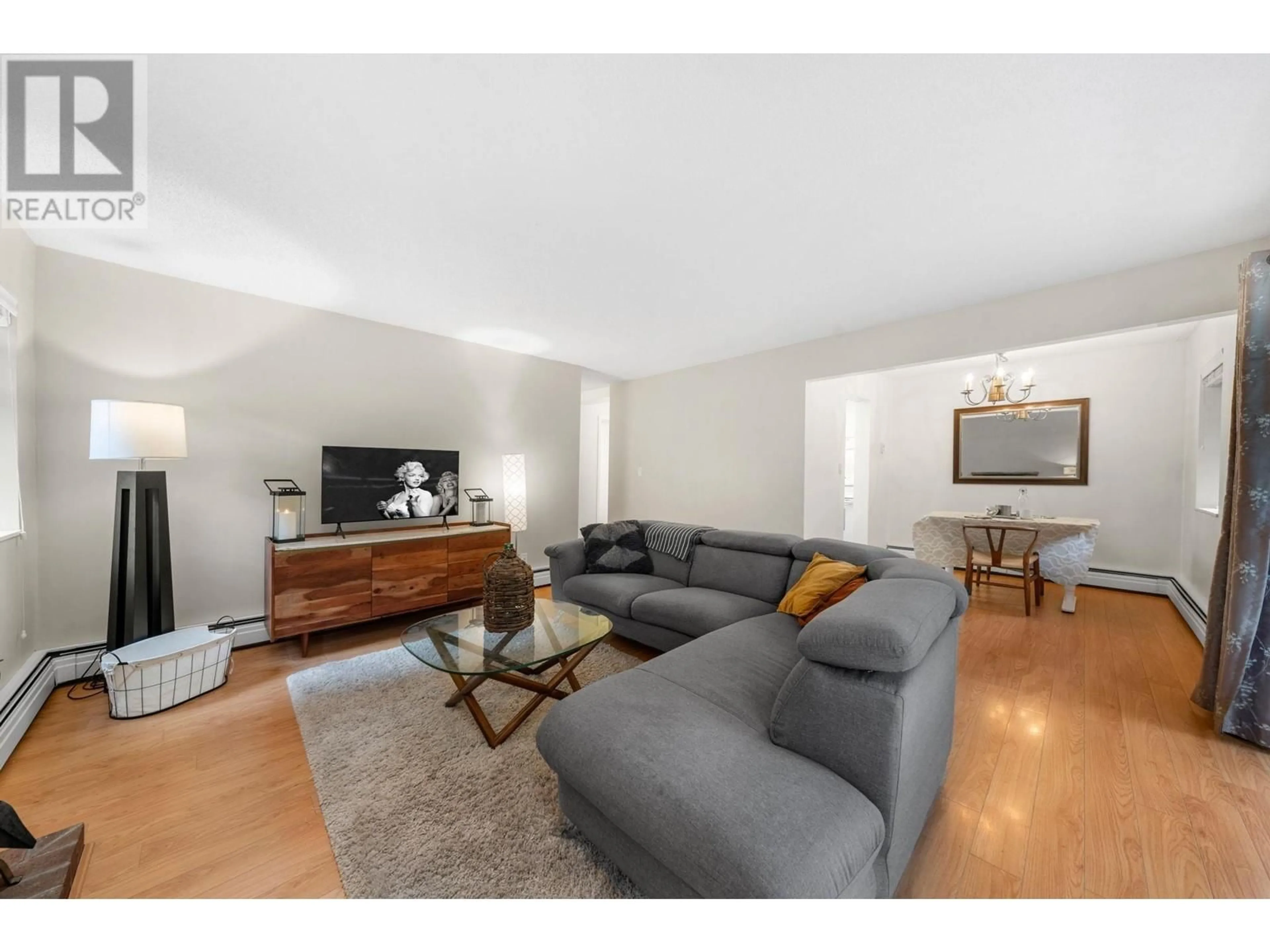 Living room with furniture, unknown for 203 - 1355 HARWOOD STREET, Vancouver British Columbia V6E3W3