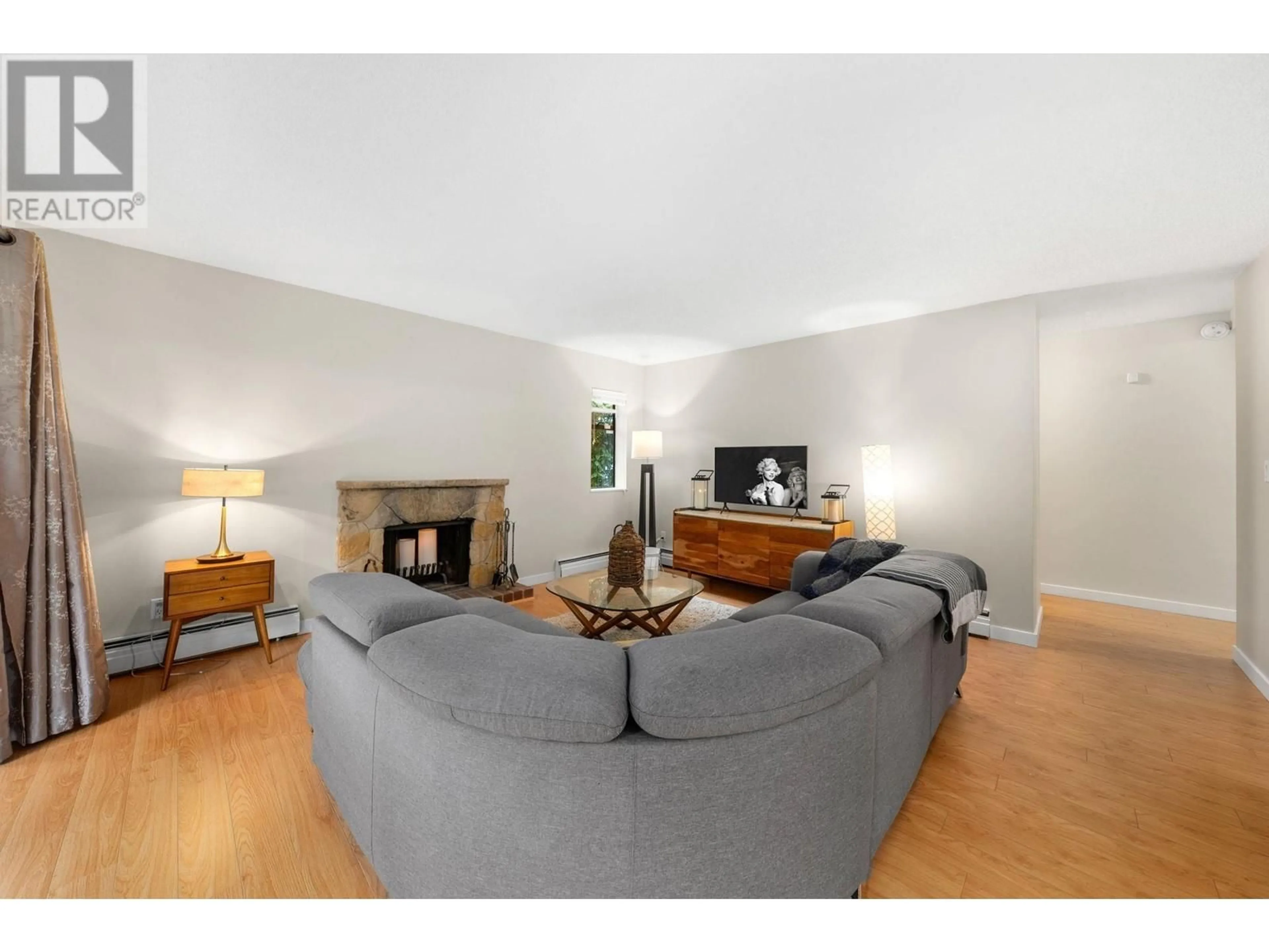 Living room with furniture, unknown for 203 - 1355 HARWOOD STREET, Vancouver British Columbia V6E3W3