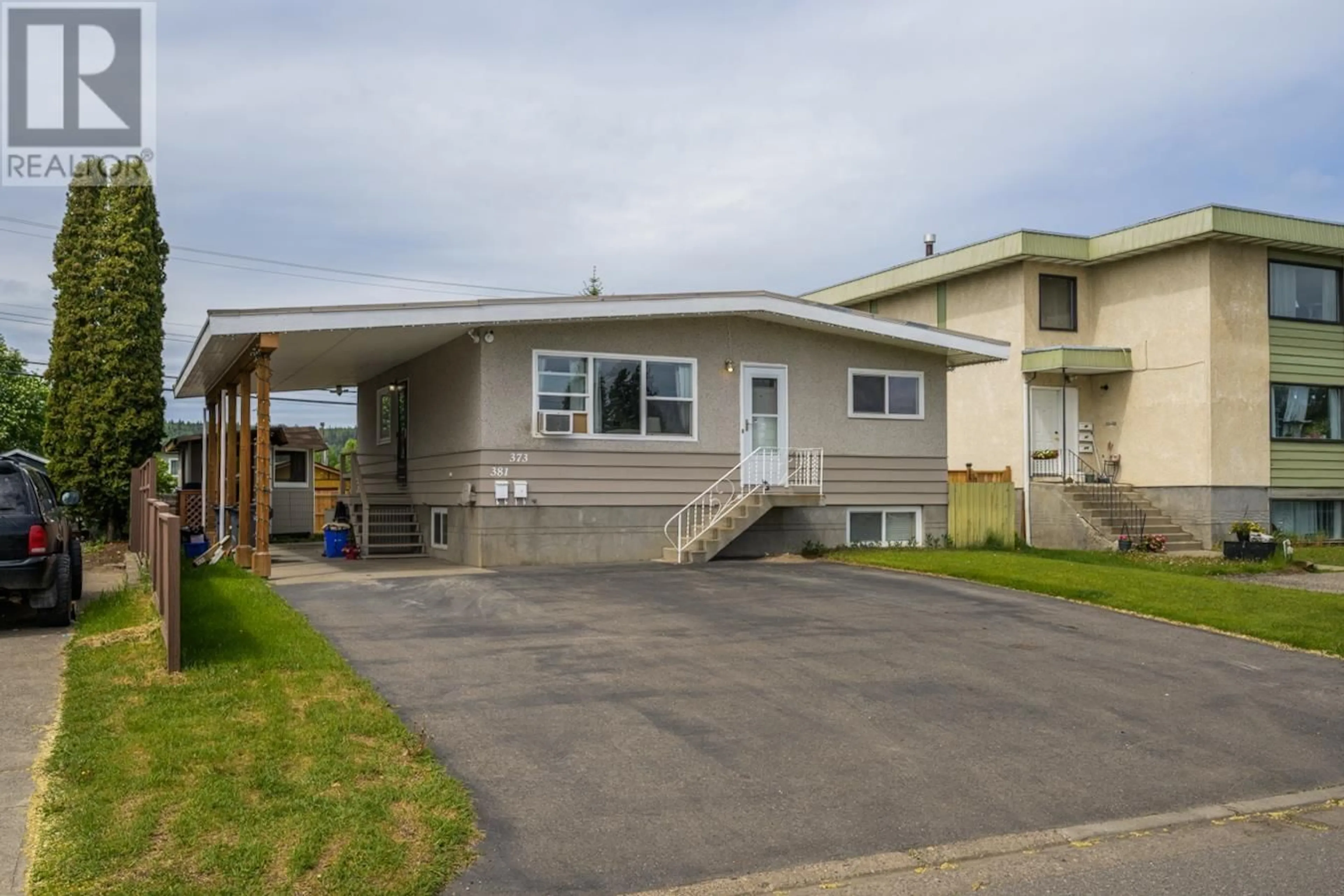 Home with vinyl exterior material, street for 373 NICHOLSON STREET, Prince George British Columbia V2M3L8