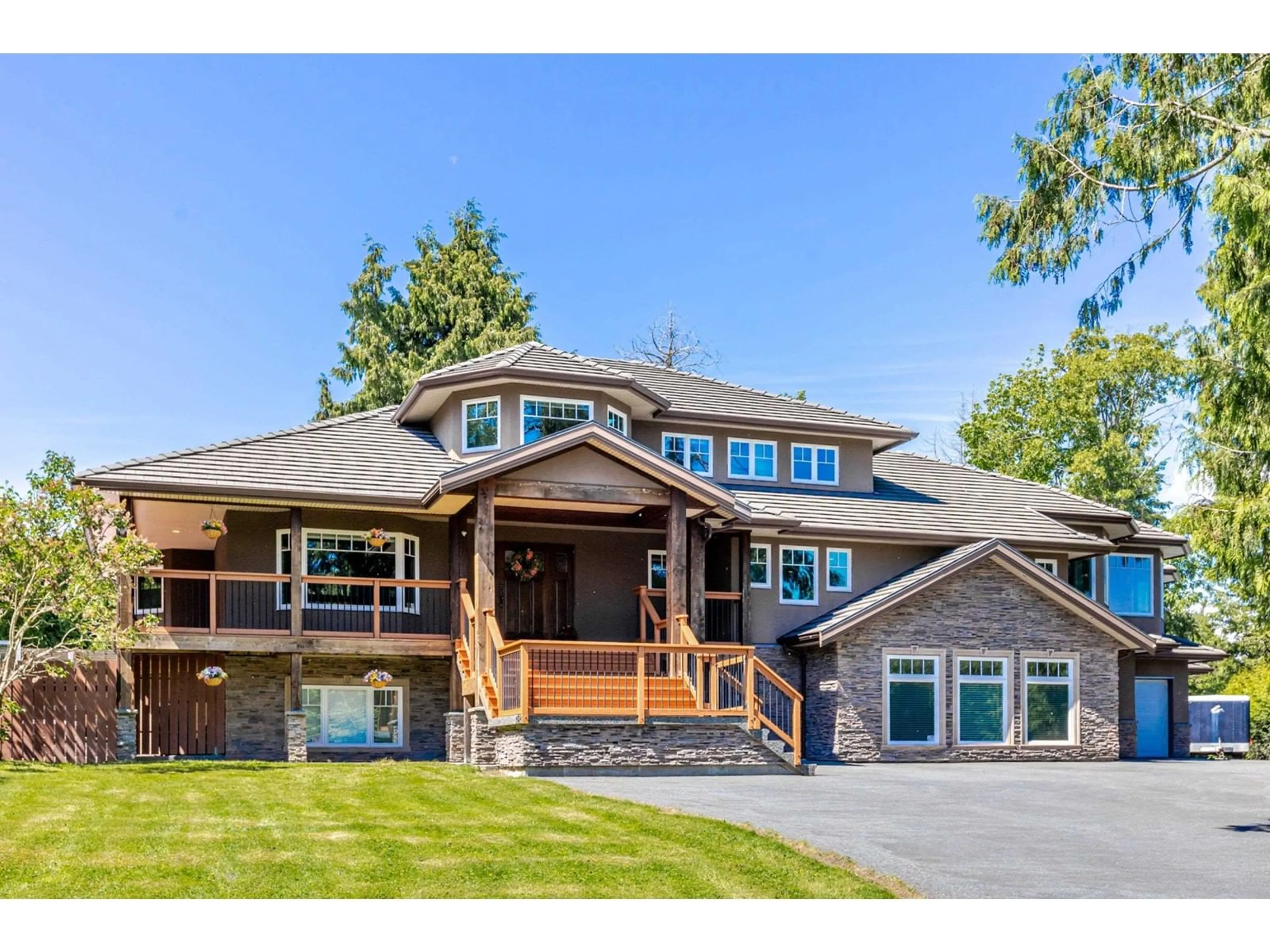 Home with brick exterior material, mountain view for 2073 183RD, Surrey British Columbia V3Z9W1