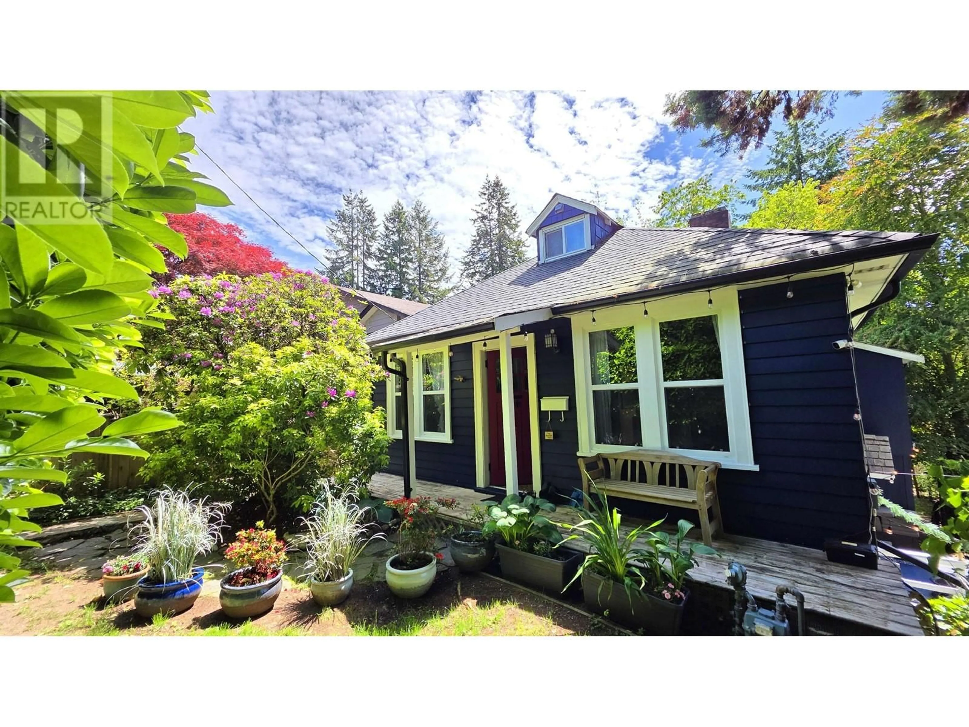 A pic from outside/outdoor area/front of a property/back of a property/a pic from drone, street for 221 23RD STREET, North Vancouver British Columbia V7M2B4