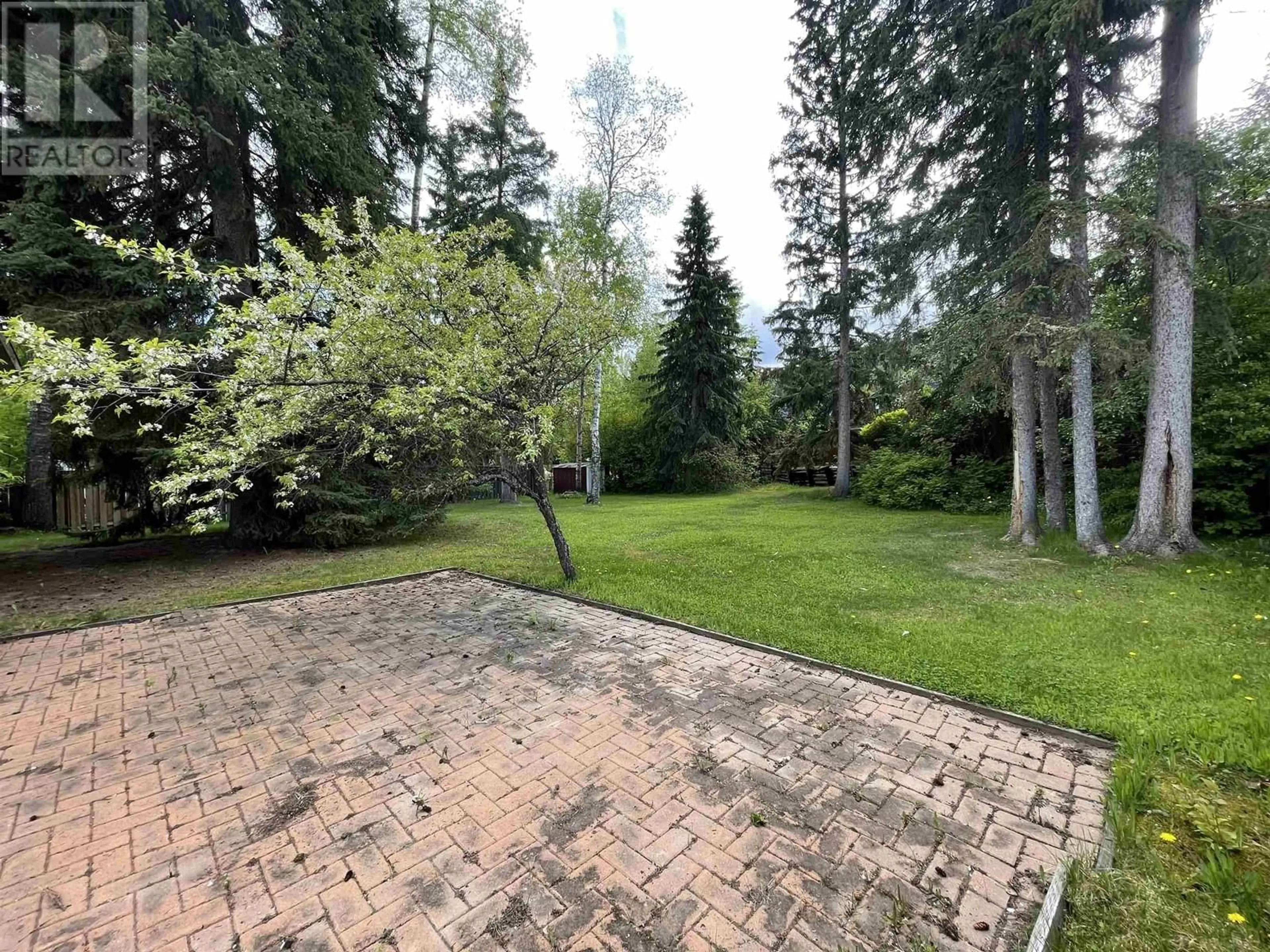 Patio, forest/trees view for 985 LIMESTONE CRESCENT, Prince George British Columbia V2M4Z3